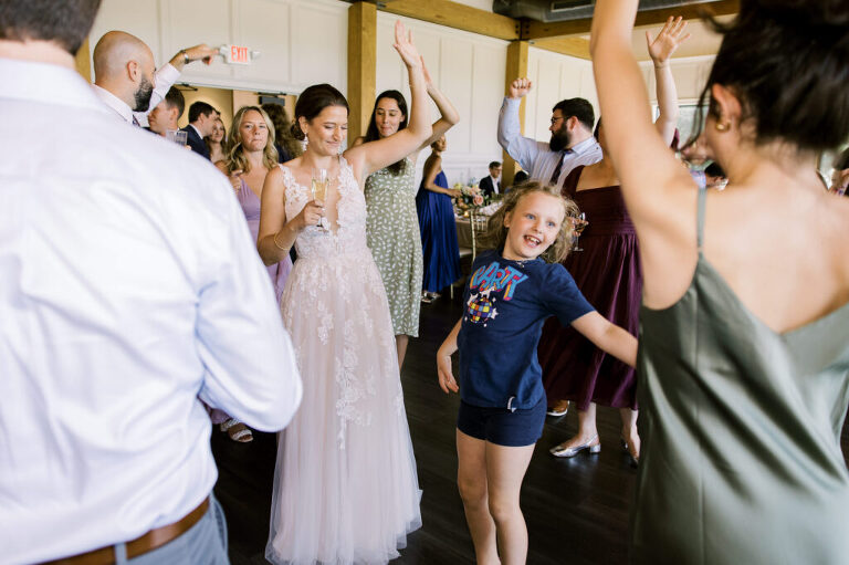 Leah and Kevin’s wedding was nothing short of enchanting—fitting for two fellow Harry Potter fans! From the emotional first look to their joyous celebration surrounded by family and friends, their special day was filled with love, laughter, and memorable moments.
Their day began early at The View at Lincoln Park, one of Jersey City’s newest and most unique wedding venues, part of the esteemed Landmark Venues collection. Nestled within the historic Lincoln Park, The View offers a modern yet timeless space with breathtaking scenery. The venue’s design is a stunning adaptive reuse of the original Lincoln Lodge (est. 1929), featuring preserved stone facades, timber beams, and antique fixtures. This blend of contemporary elegance and historic charm makes it a truly one-of-a-kind setting for weddings.
When I arrived, I was excited to explore the property and its surroundings. The View’s lush grounds, picturesque willow tree, and nearby landmarks, including the Lincoln Park Fountain, provide endless opportunities for stunning photographs. The morning was quiet as Leah and her bridesmaids arrived, carrying their dresses over their shoulders, and settled into the spacious bridal suite. Later, Kevin and their families arrived, and the anticipation began to build.
Leah and Kevin’s first look by the willow tree was a moment to remember. As the wind danced through the branches, tears filled Leah’s eyes as they read their vows to each other—an intimate, heartfelt exchange that perfectly set the tone for the day.
Guests began filling the chairs in Lincoln Room (the third-floor ceremony space), a modern area with large windows that allow natural light to flood in. This versatile room offers an elegant setting for ceremonies, with views of the surrounding park and cityscape. As Leah walked down the aisle with her father, they exchanged emotional glances, and the energy in the room was palpable.
The celebration moved to The Ballroom, The View’s stunning reception space. With its high ceilings, contemporary design, and floor-to-ceiling windows offering views of the park, the room was transformed into the perfect party atmosphere. Guests cheered as Leah and Kevin made their grand entrance, and their first dance kicked off an evening of fun, laughter, and memories.
Before the day concluded, Kevin had a special request for a photo by the Lincoln Park Fountain, a highlight of the park’s charm. We strolled over with Leah and Kevin to capture some magical portraits by the water. One of the great things about daytime weddings at The View is the ample natural light, ensuring we had beautiful lighting for photos even after the reception.
Leah and Kevin’s wedding was a joy to photograph, and The View at Lincoln Park provided the perfect backdrop for their unforgettable day. Congratulations to the happy couple—I’m so grateful to have been part of your story!
Leah and Kevin's The View at Lincoln Park Jersey City NJ documented by Karis from Hey Karis New York, Brooklyn, Hudson Valley NY and Catskills NY and NJ Wedding and NYC Elopement Photographer.

