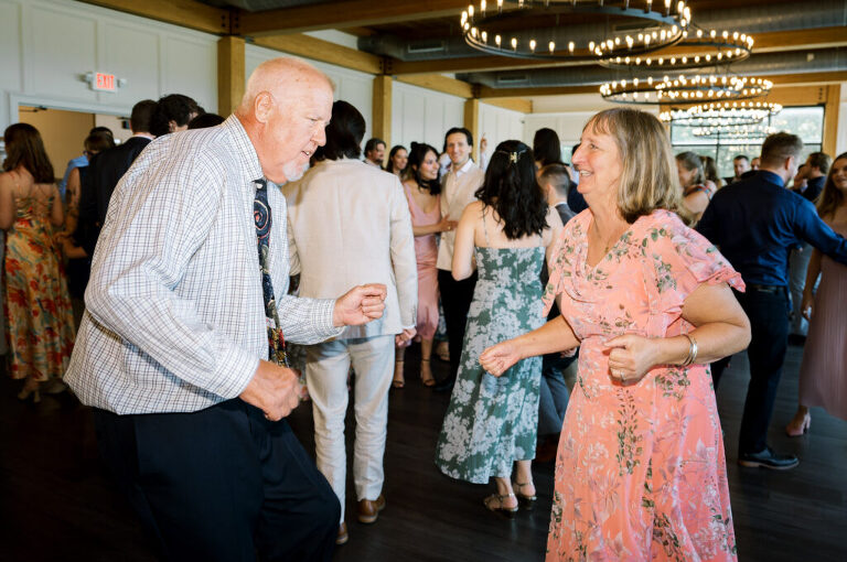 Leah and Kevin’s wedding was nothing short of enchanting—fitting for two fellow Harry Potter fans! From the emotional first look to their joyous celebration surrounded by family and friends, their special day was filled with love, laughter, and memorable moments.
Their day began early at The View at Lincoln Park, one of Jersey City’s newest and most unique wedding venues, part of the esteemed Landmark Venues collection. Nestled within the historic Lincoln Park, The View offers a modern yet timeless space with breathtaking scenery. The venue’s design is a stunning adaptive reuse of the original Lincoln Lodge (est. 1929), featuring preserved stone facades, timber beams, and antique fixtures. This blend of contemporary elegance and historic charm makes it a truly one-of-a-kind setting for weddings.
When I arrived, I was excited to explore the property and its surroundings. The View’s lush grounds, picturesque willow tree, and nearby landmarks, including the Lincoln Park Fountain, provide endless opportunities for stunning photographs. The morning was quiet as Leah and her bridesmaids arrived, carrying their dresses over their shoulders, and settled into the spacious bridal suite. Later, Kevin and their families arrived, and the anticipation began to build.
Leah and Kevin’s first look by the willow tree was a moment to remember. As the wind danced through the branches, tears filled Leah’s eyes as they read their vows to each other—an intimate, heartfelt exchange that perfectly set the tone for the day.
Guests began filling the chairs in Lincoln Room (the third-floor ceremony space), a modern area with large windows that allow natural light to flood in. This versatile room offers an elegant setting for ceremonies, with views of the surrounding park and cityscape. As Leah walked down the aisle with her father, they exchanged emotional glances, and the energy in the room was palpable.
The celebration moved to The Ballroom, The View’s stunning reception space. With its high ceilings, contemporary design, and floor-to-ceiling windows offering views of the park, the room was transformed into the perfect party atmosphere. Guests cheered as Leah and Kevin made their grand entrance, and their first dance kicked off an evening of fun, laughter, and memories.
Before the day concluded, Kevin had a special request for a photo by the Lincoln Park Fountain, a highlight of the park’s charm. We strolled over with Leah and Kevin to capture some magical portraits by the water. One of the great things about daytime weddings at The View is the ample natural light, ensuring we had beautiful lighting for photos even after the reception.
Leah and Kevin’s wedding was a joy to photograph, and The View at Lincoln Park provided the perfect backdrop for their unforgettable day. Congratulations to the happy couple—I’m so grateful to have been part of your story!
Leah and Kevin's The View at Lincoln Park Jersey City NJ documented by Karis from Hey Karis New York, Brooklyn, Hudson Valley NY and Catskills NY and NJ Wedding and NYC Elopement Photographer.
