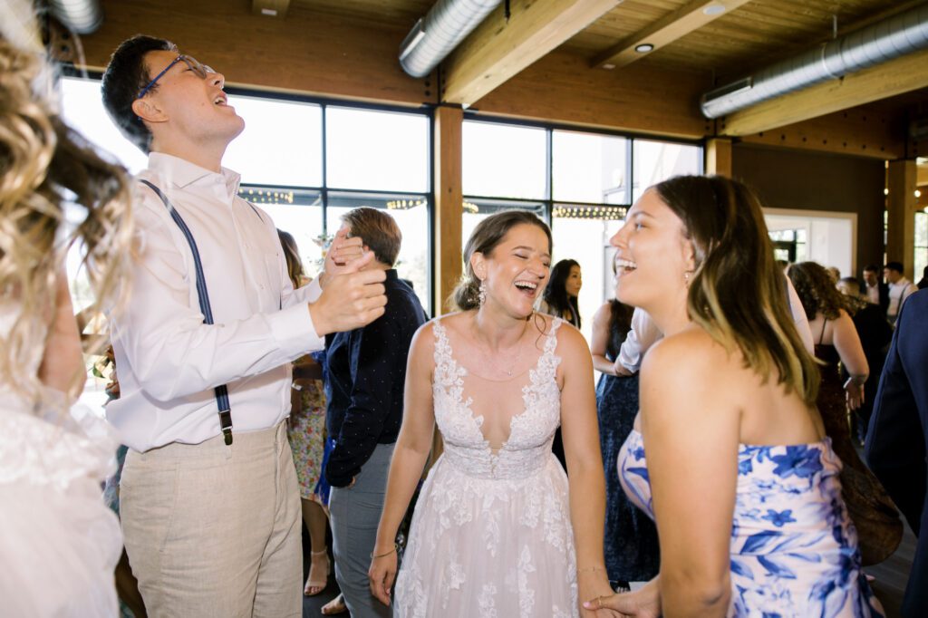 Leah and Kevin’s wedding was nothing short of enchanting—fitting for two fellow Harry Potter fans! From the emotional first look to their joyous celebration surrounded by family and friends, their special day was filled with love, laughter, and memorable moments.
Their day began early at The View at Lincoln Park, one of Jersey City’s newest and most unique wedding venues, part of the esteemed Landmark Venues collection. Nestled within the historic Lincoln Park, The View offers a modern yet timeless space with breathtaking scenery. The venue’s design is a stunning adaptive reuse of the original Lincoln Lodge (est. 1929), featuring preserved stone facades, timber beams, and antique fixtures. This blend of contemporary elegance and historic charm makes it a truly one-of-a-kind setting for weddings.
When I arrived, I was excited to explore the property and its surroundings. The View’s lush grounds, picturesque willow tree, and nearby landmarks, including the Lincoln Park Fountain, provide endless opportunities for stunning photographs. The morning was quiet as Leah and her bridesmaids arrived, carrying their dresses over their shoulders, and settled into the spacious bridal suite. Later, Kevin and their families arrived, and the anticipation began to build.
Leah and Kevin’s first look by the willow tree was a moment to remember. As the wind danced through the branches, tears filled Leah’s eyes as they read their vows to each other—an intimate, heartfelt exchange that perfectly set the tone for the day.
Guests began filling the chairs in Lincoln Room (the third-floor ceremony space), a modern area with large windows that allow natural light to flood in. This versatile room offers an elegant setting for ceremonies, with views of the surrounding park and cityscape. As Leah walked down the aisle with her father, they exchanged emotional glances, and the energy in the room was palpable.
The celebration moved to The Ballroom, The View’s stunning reception space. With its high ceilings, contemporary design, and floor-to-ceiling windows offering views of the park, the room was transformed into the perfect party atmosphere. Guests cheered as Leah and Kevin made their grand entrance, and their first dance kicked off an evening of fun, laughter, and memories.
Before the day concluded, Kevin had a special request for a photo by the Lincoln Park Fountain, a highlight of the park’s charm. We strolled over with Leah and Kevin to capture some magical portraits by the water. One of the great things about daytime weddings at The View is the ample natural light, ensuring we had beautiful lighting for photos even after the reception.
Leah and Kevin’s wedding was a joy to photograph, and The View at Lincoln Park provided the perfect backdrop for their unforgettable day. Congratulations to the happy couple—I’m so grateful to have been part of your story!
Leah and Kevin's The View at Lincoln Park Jersey City NJ documented by Karis from Hey Karis New York, Brooklyn, Hudson Valley NY and Catskills NY and NJ Wedding and NYC Elopement Photographer.
