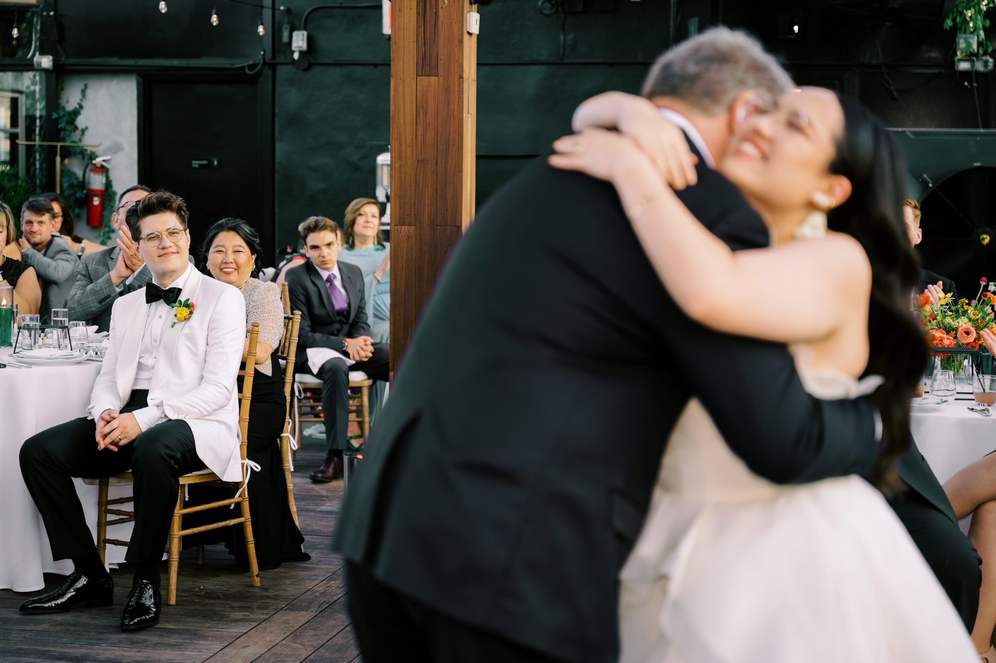 So excited for Erika and Andrei’s wedding day at The Box House Hotel in Brooklyn, NY. This boutique hotel had been on my bucket list for a while, and it did not disappoint! With its unique design, vibrant personality, and incredible rooftop views, The Box House Hotel provided the perfect setting for unique wedding celebration.
The day began with Erika and Andrei getting ready in their respective rooms, surrounded by friends and loved ones. One of the standout features of The Box House Hotel is its boutique charm and eclectic style, blending industrial elements with a cozy, artistic vibe. Erika’s bridal suite, with its floor-to-ceiling windows, was filled with natural light, making it a dream space for capturing those intimate getting-ready moments.
Once everyone was ready, Andrei headed to the rooftop, eagerly waiting to see his bride for the first time. As Erika gracefully approached, her dress swaying in the breeze, Andrei turned around, completely captivated. The two shared a private, heartfelt moment, whispering sweet words to each other, before we moved on to family photos.
The Box House Hotel’s location on a quiet Brooklyn street was perfect for photos. We captured their formal family and bridal party shots right in front of the hotel, showcasing its charming exterior. Then came a unique tradition I’d never witnessed before in my 14+ years of wedding photography! Erika and Andrei brought out a bucket of water filled with coins, and as guests cheered, Erika kicked the bucket as far as she could—a cultural ritual symbolizing good luck and prosperity. It was a joy to photograph and such a fun, memorable moment!
Afterward, we made our way back to the 10,000-square-foot rooftop, which offers unparalleled panoramic views of Manhattan, Brooklyn, and Long Island City. It’s a breathtaking setting for any wedding, leaving guests in awe of the skyline. Friends and family traveled from near and far, including Japan and Romania, to celebrate Erika and Andrei. To honor Erika's Japanese roots, Erika and Andrei incorporated a Japanese tea ceremony officiated by Erika's cousins from Japan. The rooftop was filled with laughter, love, and joy as the ceremony unfolded under the open sky.
As the sun set, the magic of the evening truly came alive. The city skyline twinkled with lights, and the dark sky sparkled with stars. Erika and Andrei danced, laughed, and celebrated late into the night, surrounded by their closest friends and family.
The Box House Hotel is a one-of-a-kind venue, blending urban sophistication with artistic charm. Its rooftop views, boutique-style accommodations, and vibrant atmosphere make it a perfect choice for couples looking to create a unique and unforgettable wedding experience.
Erika and Andrei, thank you for letting me be part of your incredible day. Wishing you a lifetime of love, happiness, and adventure!
Erika and Andrei The Box House Hotel Brooklyn NY Wedding documented by Karis from Hey Karis New York, Brooklyn, Hudson Valley NY and Catskills NY and NJ Wedding and NYC Elopement Photographer.