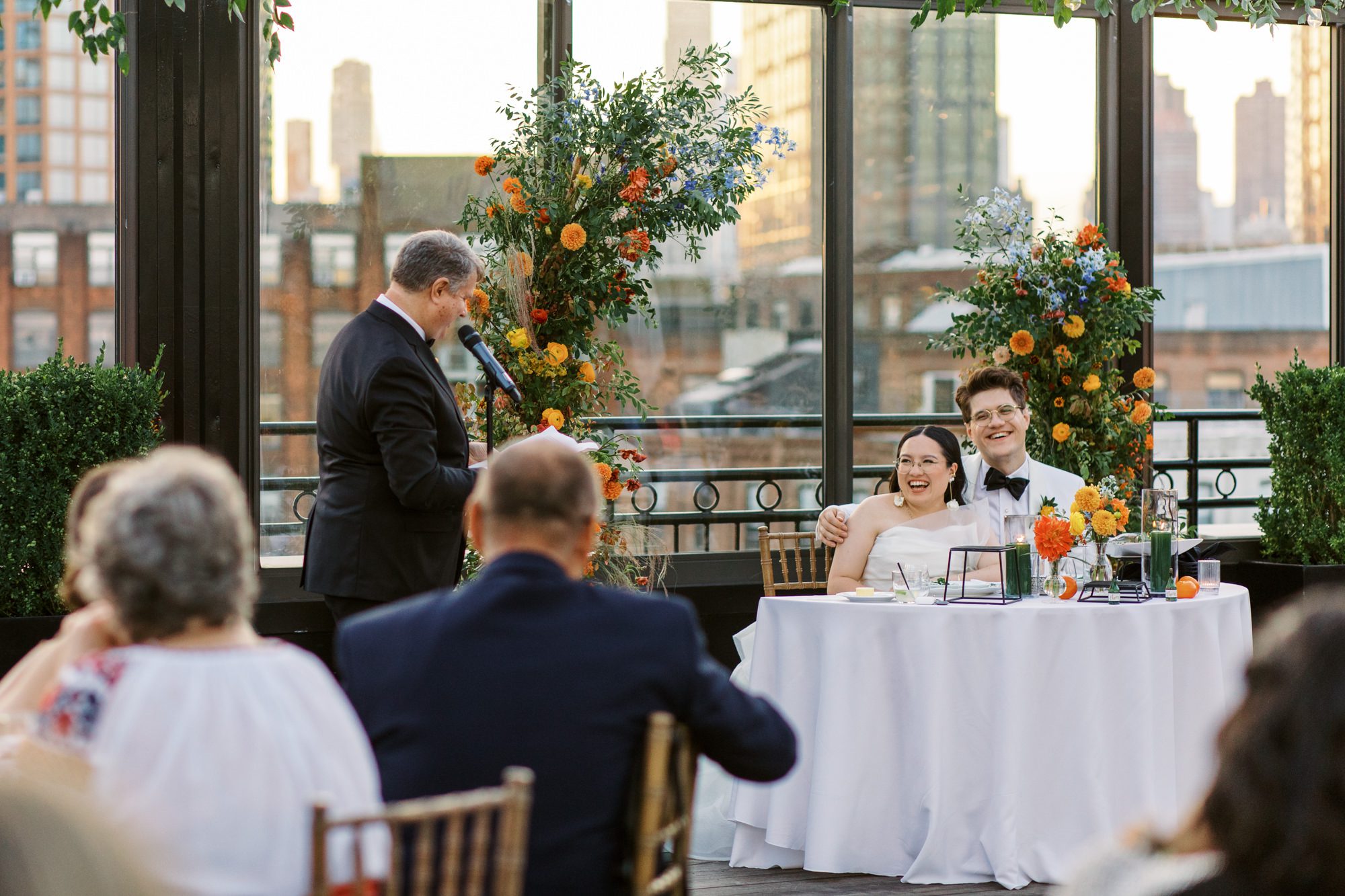 So excited for Erika and Andrei’s wedding day at The Box House Hotel in Brooklyn, NY. This boutique hotel had been on my bucket list for a while, and it did not disappoint! With its unique design, vibrant personality, and incredible rooftop views, The Box House Hotel provided the perfect setting for unique wedding celebration.
The day began with Erika and Andrei getting ready in their respective rooms, surrounded by friends and loved ones. One of the standout features of The Box House Hotel is its boutique charm and eclectic style, blending industrial elements with a cozy, artistic vibe. Erika’s bridal suite, with its floor-to-ceiling windows, was filled with natural light, making it a dream space for capturing those intimate getting-ready moments.
Once everyone was ready, Andrei headed to the rooftop, eagerly waiting to see his bride for the first time. As Erika gracefully approached, her dress swaying in the breeze, Andrei turned around, completely captivated. The two shared a private, heartfelt moment, whispering sweet words to each other, before we moved on to family photos.
The Box House Hotel’s location on a quiet Brooklyn street was perfect for photos. We captured their formal family and bridal party shots right in front of the hotel, showcasing its charming exterior. Then came a unique tradition I’d never witnessed before in my 14+ years of wedding photography! Erika and Andrei brought out a bucket of water filled with coins, and as guests cheered, Erika kicked the bucket as far as she could—a cultural ritual symbolizing good luck and prosperity. It was a joy to photograph and such a fun, memorable moment!
Afterward, we made our way back to the 10,000-square-foot rooftop, which offers unparalleled panoramic views of Manhattan, Brooklyn, and Long Island City. It’s a breathtaking setting for any wedding, leaving guests in awe of the skyline. Friends and family traveled from near and far, including Japan and Romania, to celebrate Erika and Andrei. To honor Erika's Japanese roots, Erika and Andrei incorporated a Japanese tea ceremony officiated by Erika's cousins from Japan. The rooftop was filled with laughter, love, and joy as the ceremony unfolded under the open sky.
As the sun set, the magic of the evening truly came alive. The city skyline twinkled with lights, and the dark sky sparkled with stars. Erika and Andrei danced, laughed, and celebrated late into the night, surrounded by their closest friends and family.
The Box House Hotel is a one-of-a-kind venue, blending urban sophistication with artistic charm. Its rooftop views, boutique-style accommodations, and vibrant atmosphere make it a perfect choice for couples looking to create a unique and unforgettable wedding experience.
Erika and Andrei, thank you for letting me be part of your incredible day. Wishing you a lifetime of love, happiness, and adventure!
Erika and Andrei The Box House Hotel Brooklyn NY Wedding documented by Karis from Hey Karis New York, Brooklyn, Hudson Valley NY and Catskills NY and NJ Wedding and NYC Elopement Photographer.