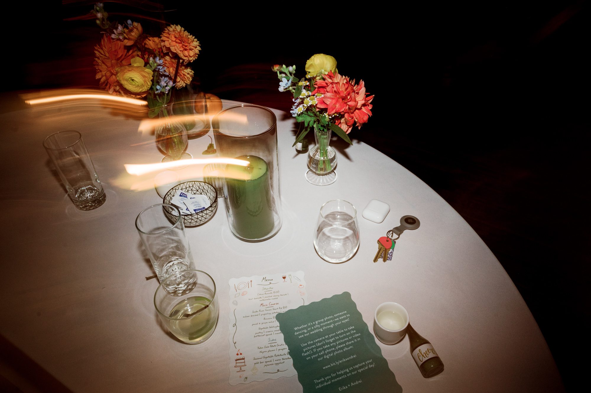 So excited for Erika and Andrei’s wedding day at The Box House Hotel in Brooklyn, NY. This boutique hotel had been on my bucket list for a while, and it did not disappoint! With its unique design, vibrant personality, and incredible rooftop views, The Box House Hotel provided the perfect setting for unique wedding celebration.
The day began with Erika and Andrei getting ready in their respective rooms, surrounded by friends and loved ones. One of the standout features of The Box House Hotel is its boutique charm and eclectic style, blending industrial elements with a cozy, artistic vibe. Erika’s bridal suite, with its floor-to-ceiling windows, was filled with natural light, making it a dream space for capturing those intimate getting-ready moments.
Once everyone was ready, Andrei headed to the rooftop, eagerly waiting to see his bride for the first time. As Erika gracefully approached, her dress swaying in the breeze, Andrei turned around, completely captivated. The two shared a private, heartfelt moment, whispering sweet words to each other, before we moved on to family photos.
The Box House Hotel’s location on a quiet Brooklyn street was perfect for photos. We captured their formal family and bridal party shots right in front of the hotel, showcasing its charming exterior. Then came a unique tradition I’d never witnessed before in my 14+ years of wedding photography! Erika and Andrei brought out a bucket of water filled with coins, and as guests cheered, Erika kicked the bucket as far as she could—a cultural ritual symbolizing good luck and prosperity. It was a joy to photograph and such a fun, memorable moment!
Afterward, we made our way back to the 10,000-square-foot rooftop, which offers unparalleled panoramic views of Manhattan, Brooklyn, and Long Island City. It’s a breathtaking setting for any wedding, leaving guests in awe of the skyline. Friends and family traveled from near and far, including Japan and Romania, to celebrate Erika and Andrei. To honor Erika's Japanese roots, Erika and Andrei incorporated a Japanese tea ceremony officiated by Erika's cousins from Japan. The rooftop was filled with laughter, love, and joy as the ceremony unfolded under the open sky.
As the sun set, the magic of the evening truly came alive. The city skyline twinkled with lights, and the dark sky sparkled with stars. Erika and Andrei danced, laughed, and celebrated late into the night, surrounded by their closest friends and family.
The Box House Hotel is a one-of-a-kind venue, blending urban sophistication with artistic charm. Its rooftop views, boutique-style accommodations, and vibrant atmosphere make it a perfect choice for couples looking to create a unique and unforgettable wedding experience.
Erika and Andrei, thank you for letting me be part of your incredible day. Wishing you a lifetime of love, happiness, and adventure!
Erika and Andrei The Box House Hotel Brooklyn NY Wedding documented by Karis from Hey Karis New York, Brooklyn, Hudson Valley NY and Catskills NY and NJ Wedding and NYC Elopement Photographer.