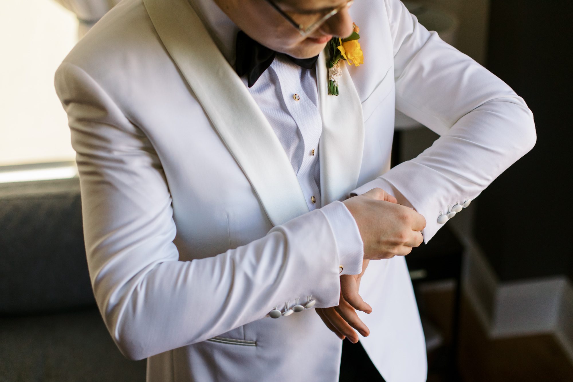 So excited for Erika and Andrei’s wedding day at The Box House Hotel in Brooklyn, NY. This boutique hotel had been on my bucket list for a while, and it did not disappoint! With its unique design, vibrant personality, and incredible rooftop views, The Box House Hotel provided the perfect setting for unique wedding celebration.
The day began with Erika and Andrei getting ready in their respective rooms, surrounded by friends and loved ones. One of the standout features of The Box House Hotel is its boutique charm and eclectic style, blending industrial elements with a cozy, artistic vibe. Erika’s bridal suite, with its floor-to-ceiling windows, was filled with natural light, making it a dream space for capturing those intimate getting-ready moments.
Once everyone was ready, Andrei headed to the rooftop, eagerly waiting to see his bride for the first time. As Erika gracefully approached, her dress swaying in the breeze, Andrei turned around, completely captivated. The two shared a private, heartfelt moment, whispering sweet words to each other, before we moved on to family photos.
The Box House Hotel’s location on a quiet Brooklyn street was perfect for photos. We captured their formal family and bridal party shots right in front of the hotel, showcasing its charming exterior. Then came a unique tradition I’d never witnessed before in my 14+ years of wedding photography! Erika and Andrei brought out a bucket of water filled with coins, and as guests cheered, Erika kicked the bucket as far as she could—a cultural ritual symbolizing good luck and prosperity. It was a joy to photograph and such a fun, memorable moment!
Afterward, we made our way back to the 10,000-square-foot rooftop, which offers unparalleled panoramic views of Manhattan, Brooklyn, and Long Island City. It’s a breathtaking setting for any wedding, leaving guests in awe of the skyline. Friends and family traveled from near and far, including Japan and Romania, to celebrate Erika and Andrei. To honor Erika's Japanese roots, Erika and Andrei incorporated a Japanese tea ceremony officiated by Erika's cousins from Japan. The rooftop was filled with laughter, love, and joy as the ceremony unfolded under the open sky.
As the sun set, the magic of the evening truly came alive. The city skyline twinkled with lights, and the dark sky sparkled with stars. Erika and Andrei danced, laughed, and celebrated late into the night, surrounded by their closest friends and family.
The Box House Hotel is a one-of-a-kind venue, blending urban sophistication with artistic charm. Its rooftop views, boutique-style accommodations, and vibrant atmosphere make it a perfect choice for couples looking to create a unique and unforgettable wedding experience.
Erika and Andrei, thank you for letting me be part of your incredible day. Wishing you a lifetime of love, happiness, and adventure!
Erika and Andrei The Box House Hotel Brooklyn NY Wedding documented by Karis from Hey Karis New York, Brooklyn, Hudson Valley NY and Catskills NY and NJ Wedding and NYC Elopement Photographer.