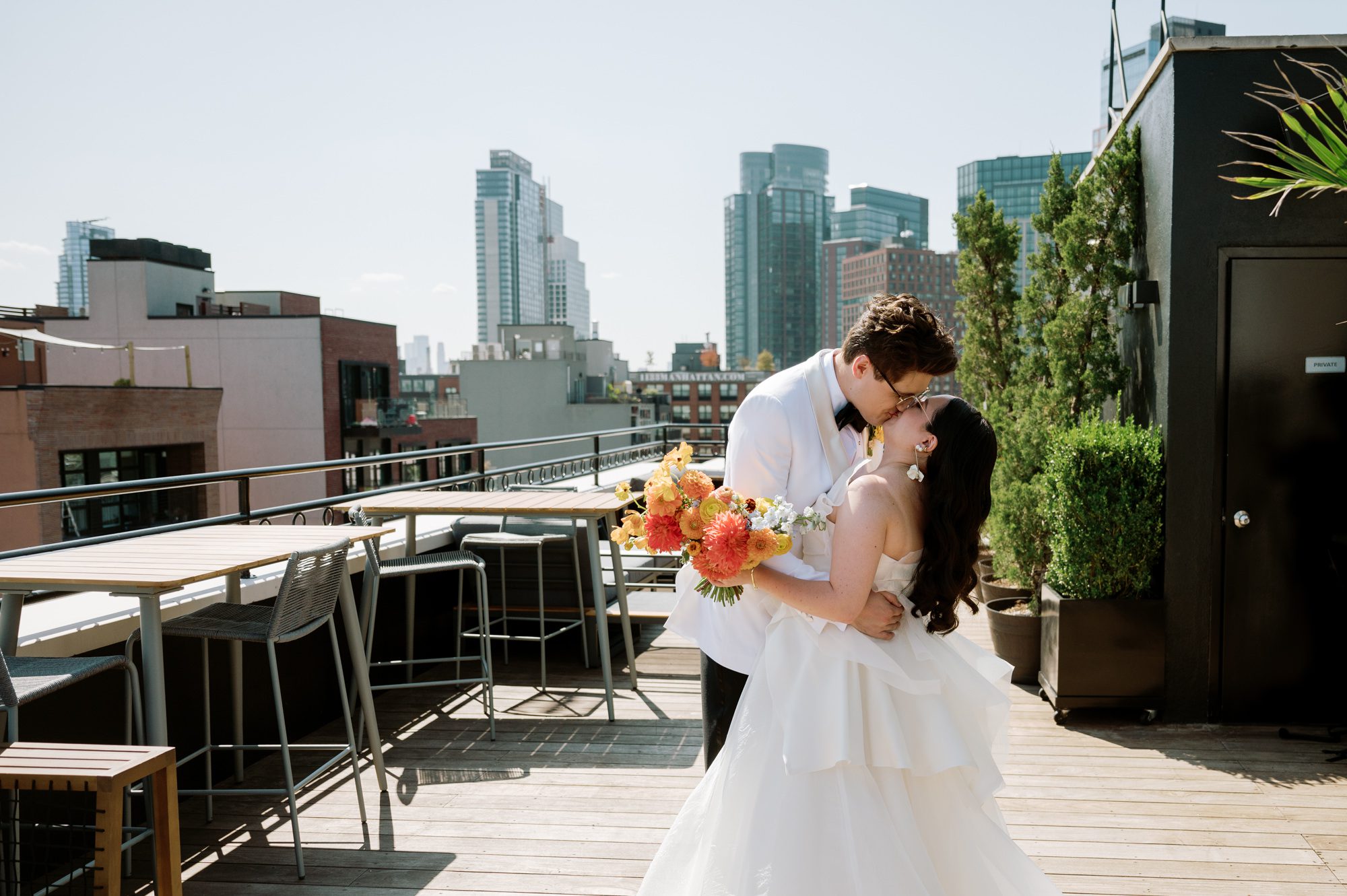 So excited for Erika and Andrei’s wedding day at The Box House Hotel in Brooklyn, NY. This boutique hotel had been on my bucket list for a while, and it did not disappoint! With its unique design, vibrant personality, and incredible rooftop views, The Box House Hotel provided the perfect setting for unique wedding celebration.
The day began with Erika and Andrei getting ready in their respective rooms, surrounded by friends and loved ones. One of the standout features of The Box House Hotel is its boutique charm and eclectic style, blending industrial elements with a cozy, artistic vibe. Erika’s bridal suite, with its floor-to-ceiling windows, was filled with natural light, making it a dream space for capturing those intimate getting-ready moments.
Once everyone was ready, Andrei headed to the rooftop, eagerly waiting to see his bride for the first time. As Erika gracefully approached, her dress swaying in the breeze, Andrei turned around, completely captivated. The two shared a private, heartfelt moment, whispering sweet words to each other, before we moved on to family photos.
The Box House Hotel’s location on a quiet Brooklyn street was perfect for photos. We captured their formal family and bridal party shots right in front of the hotel, showcasing its charming exterior. Then came a unique tradition I’d never witnessed before in my 14+ years of wedding photography! Erika and Andrei brought out a bucket of water filled with coins, and as guests cheered, Erika kicked the bucket as far as she could—a cultural ritual symbolizing good luck and prosperity. It was a joy to photograph and such a fun, memorable moment!
Afterward, we made our way back to the 10,000-square-foot rooftop, which offers unparalleled panoramic views of Manhattan, Brooklyn, and Long Island City. It’s a breathtaking setting for any wedding, leaving guests in awe of the skyline. Friends and family traveled from near and far, including Japan and Romania, to celebrate Erika and Andrei. To honor Erika's Japanese roots, Erika and Andrei incorporated a Japanese tea ceremony officiated by Erika's cousins from Japan. The rooftop was filled with laughter, love, and joy as the ceremony unfolded under the open sky.
As the sun set, the magic of the evening truly came alive. The city skyline twinkled with lights, and the dark sky sparkled with stars. Erika and Andrei danced, laughed, and celebrated late into the night, surrounded by their closest friends and family.
The Box House Hotel is a one-of-a-kind venue, blending urban sophistication with artistic charm. Its rooftop views, boutique-style accommodations, and vibrant atmosphere make it a perfect choice for couples looking to create a unique and unforgettable wedding experience.
Erika and Andrei, thank you for letting me be part of your incredible day. Wishing you a lifetime of love, happiness, and adventure!
Erika and Andrei The Box House Hotel Brooklyn NY Wedding documented by Karis from Hey Karis New York, Brooklyn, Hudson Valley NY and Catskills NY and NJ Wedding and NYC Elopement Photographer.