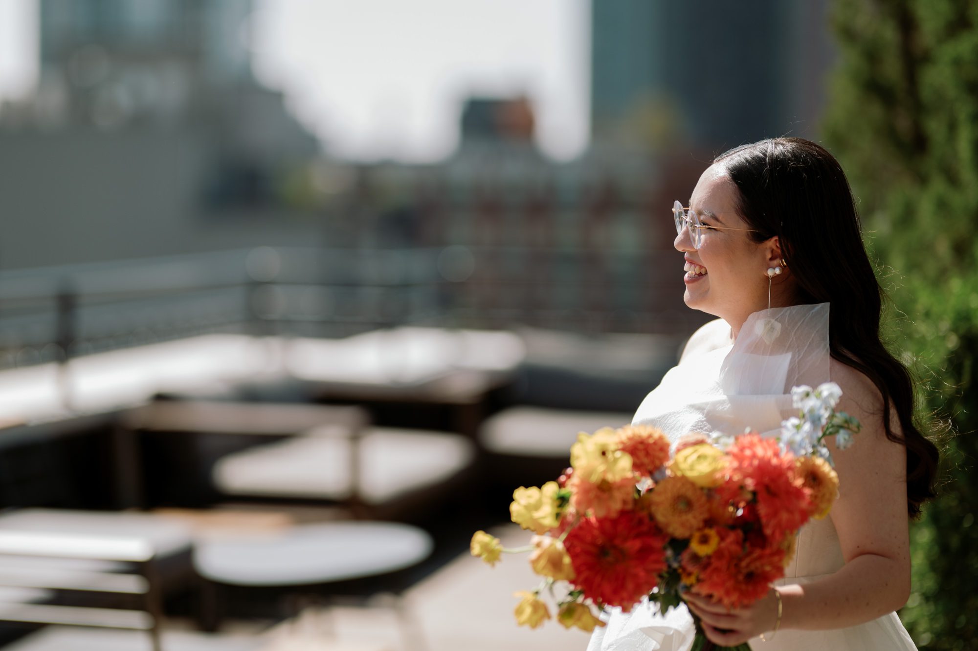 So excited for Erika and Andrei’s wedding day at The Box House Hotel in Brooklyn, NY. This boutique hotel had been on my bucket list for a while, and it did not disappoint! With its unique design, vibrant personality, and incredible rooftop views, The Box House Hotel provided the perfect setting for unique wedding celebration.
The day began with Erika and Andrei getting ready in their respective rooms, surrounded by friends and loved ones. One of the standout features of The Box House Hotel is its boutique charm and eclectic style, blending industrial elements with a cozy, artistic vibe. Erika’s bridal suite, with its floor-to-ceiling windows, was filled with natural light, making it a dream space for capturing those intimate getting-ready moments.
Once everyone was ready, Andrei headed to the rooftop, eagerly waiting to see his bride for the first time. As Erika gracefully approached, her dress swaying in the breeze, Andrei turned around, completely captivated. The two shared a private, heartfelt moment, whispering sweet words to each other, before we moved on to family photos.
The Box House Hotel’s location on a quiet Brooklyn street was perfect for photos. We captured their formal family and bridal party shots right in front of the hotel, showcasing its charming exterior. Then came a unique tradition I’d never witnessed before in my 14+ years of wedding photography! Erika and Andrei brought out a bucket of water filled with coins, and as guests cheered, Erika kicked the bucket as far as she could—a cultural ritual symbolizing good luck and prosperity. It was a joy to photograph and such a fun, memorable moment!
Afterward, we made our way back to the 10,000-square-foot rooftop, which offers unparalleled panoramic views of Manhattan, Brooklyn, and Long Island City. It’s a breathtaking setting for any wedding, leaving guests in awe of the skyline. Friends and family traveled from near and far, including Japan and Romania, to celebrate Erika and Andrei. To honor Erika's Japanese roots, Erika and Andrei incorporated a Japanese tea ceremony officiated by Erika's cousins from Japan. The rooftop was filled with laughter, love, and joy as the ceremony unfolded under the open sky.
As the sun set, the magic of the evening truly came alive. The city skyline twinkled with lights, and the dark sky sparkled with stars. Erika and Andrei danced, laughed, and celebrated late into the night, surrounded by their closest friends and family.
The Box House Hotel is a one-of-a-kind venue, blending urban sophistication with artistic charm. Its rooftop views, boutique-style accommodations, and vibrant atmosphere make it a perfect choice for couples looking to create a unique and unforgettable wedding experience.
Erika and Andrei, thank you for letting me be part of your incredible day. Wishing you a lifetime of love, happiness, and adventure!
Erika and Andrei The Box House Hotel Brooklyn NY Wedding documented by Karis from Hey Karis New York, Brooklyn, Hudson Valley NY and Catskills NY and NJ Wedding and NYC Elopement Photographer.