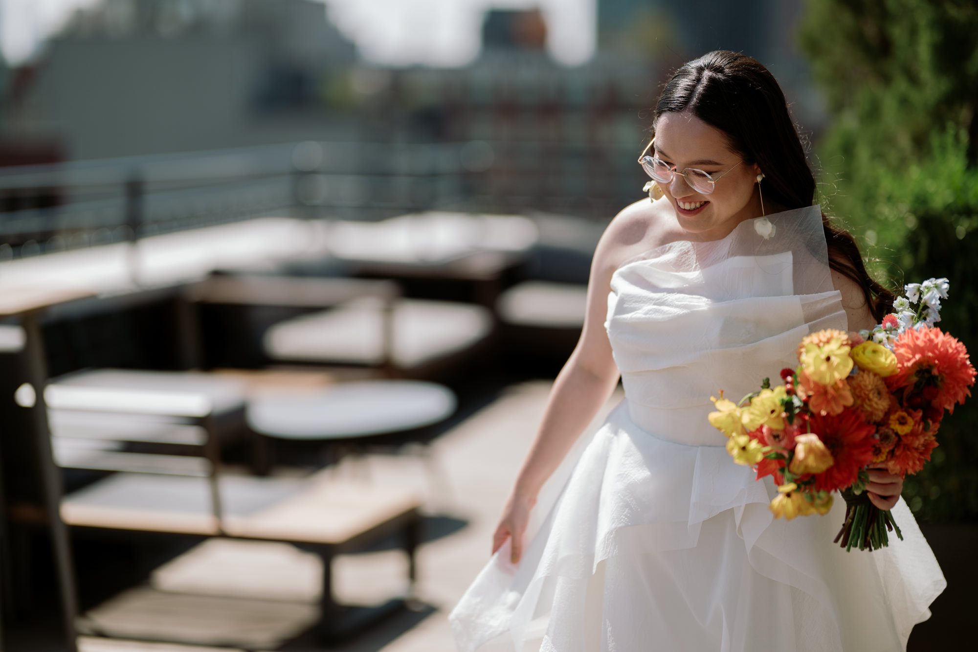 So excited for Erika and Andrei’s wedding day at The Box House Hotel in Brooklyn, NY. This boutique hotel had been on my bucket list for a while, and it did not disappoint! With its unique design, vibrant personality, and incredible rooftop views, The Box House Hotel provided the perfect setting for unique wedding celebration.
The day began with Erika and Andrei getting ready in their respective rooms, surrounded by friends and loved ones. One of the standout features of The Box House Hotel is its boutique charm and eclectic style, blending industrial elements with a cozy, artistic vibe. Erika’s bridal suite, with its floor-to-ceiling windows, was filled with natural light, making it a dream space for capturing those intimate getting-ready moments.
Once everyone was ready, Andrei headed to the rooftop, eagerly waiting to see his bride for the first time. As Erika gracefully approached, her dress swaying in the breeze, Andrei turned around, completely captivated. The two shared a private, heartfelt moment, whispering sweet words to each other, before we moved on to family photos.
The Box House Hotel’s location on a quiet Brooklyn street was perfect for photos. We captured their formal family and bridal party shots right in front of the hotel, showcasing its charming exterior. Then came a unique tradition I’d never witnessed before in my 14+ years of wedding photography! Erika and Andrei brought out a bucket of water filled with coins, and as guests cheered, Erika kicked the bucket as far as she could—a cultural ritual symbolizing good luck and prosperity. It was a joy to photograph and such a fun, memorable moment!
Afterward, we made our way back to the 10,000-square-foot rooftop, which offers unparalleled panoramic views of Manhattan, Brooklyn, and Long Island City. It’s a breathtaking setting for any wedding, leaving guests in awe of the skyline. Friends and family traveled from near and far, including Japan and Romania, to celebrate Erika and Andrei. To honor Erika's Japanese roots, Erika and Andrei incorporated a Japanese tea ceremony officiated by Erika's cousins from Japan. The rooftop was filled with laughter, love, and joy as the ceremony unfolded under the open sky.
As the sun set, the magic of the evening truly came alive. The city skyline twinkled with lights, and the dark sky sparkled with stars. Erika and Andrei danced, laughed, and celebrated late into the night, surrounded by their closest friends and family.
The Box House Hotel is a one-of-a-kind venue, blending urban sophistication with artistic charm. Its rooftop views, boutique-style accommodations, and vibrant atmosphere make it a perfect choice for couples looking to create a unique and unforgettable wedding experience.
Erika and Andrei, thank you for letting me be part of your incredible day. Wishing you a lifetime of love, happiness, and adventure!
Erika and Andrei The Box House Hotel Brooklyn NY Wedding documented by Karis from Hey Karis New York, Brooklyn, Hudson Valley NY and Catskills NY and NJ Wedding and NYC Elopement Photographer.