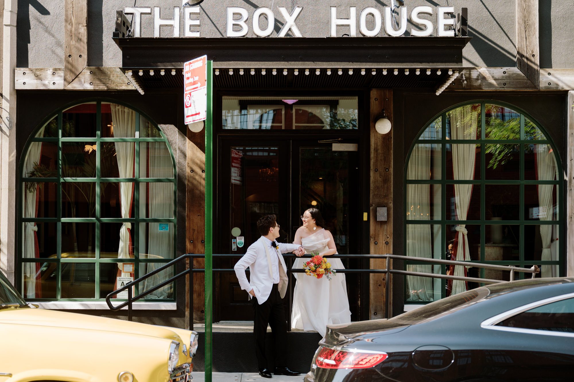 So excited for Erika and Andrei’s wedding day at The Box House Hotel in Brooklyn, NY. This boutique hotel had been on my bucket list for a while, and it did not disappoint! With its unique design, vibrant personality, and incredible rooftop views, The Box House Hotel provided the perfect setting for unique wedding celebration.
The day began with Erika and Andrei getting ready in their respective rooms, surrounded by friends and loved ones. One of the standout features of The Box House Hotel is its boutique charm and eclectic style, blending industrial elements with a cozy, artistic vibe. Erika’s bridal suite, with its floor-to-ceiling windows, was filled with natural light, making it a dream space for capturing those intimate getting-ready moments.
Once everyone was ready, Andrei headed to the rooftop, eagerly waiting to see his bride for the first time. As Erika gracefully approached, her dress swaying in the breeze, Andrei turned around, completely captivated. The two shared a private, heartfelt moment, whispering sweet words to each other, before we moved on to family photos.
The Box House Hotel’s location on a quiet Brooklyn street was perfect for photos. We captured their formal family and bridal party shots right in front of the hotel, showcasing its charming exterior. Then came a unique tradition I’d never witnessed before in my 14+ years of wedding photography! Erika and Andrei brought out a bucket of water filled with coins, and as guests cheered, Erika kicked the bucket as far as she could—a cultural ritual symbolizing good luck and prosperity. It was a joy to photograph and such a fun, memorable moment!
Afterward, we made our way back to the 10,000-square-foot rooftop, which offers unparalleled panoramic views of Manhattan, Brooklyn, and Long Island City. It’s a breathtaking setting for any wedding, leaving guests in awe of the skyline. Friends and family traveled from near and far, including Japan and Romania, to celebrate Erika and Andrei. To honor Erika's Japanese roots, Erika and Andrei incorporated a Japanese tea ceremony officiated by Erika's cousins from Japan. The rooftop was filled with laughter, love, and joy as the ceremony unfolded under the open sky.
As the sun set, the magic of the evening truly came alive. The city skyline twinkled with lights, and the dark sky sparkled with stars. Erika and Andrei danced, laughed, and celebrated late into the night, surrounded by their closest friends and family.
The Box House Hotel is a one-of-a-kind venue, blending urban sophistication with artistic charm. Its rooftop views, boutique-style accommodations, and vibrant atmosphere make it a perfect choice for couples looking to create a unique and unforgettable wedding experience.
Erika and Andrei, thank you for letting me be part of your incredible day. Wishing you a lifetime of love, happiness, and adventure!
Erika and Andrei The Box House Hotel Brooklyn NY Wedding documented by Karis from Hey Karis New York, Brooklyn, Hudson Valley NY and Catskills NY and NJ Wedding and NYC Elopement Photographer.