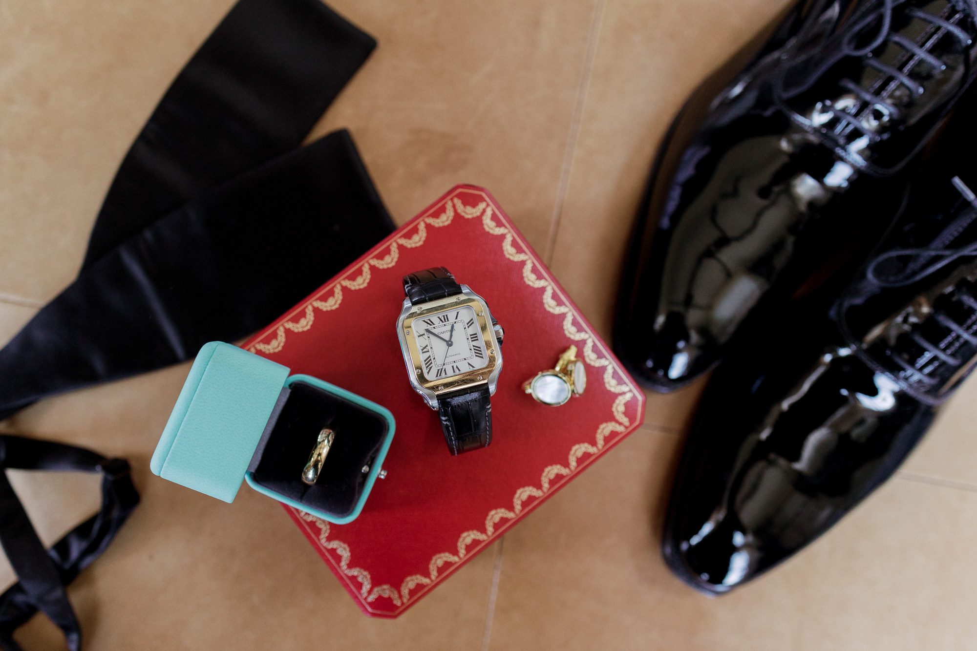 So excited for Erika and Andrei’s wedding day at The Box House Hotel in Brooklyn, NY. This boutique hotel had been on my bucket list for a while, and it did not disappoint! With its unique design, vibrant personality, and incredible rooftop views, The Box House Hotel provided the perfect setting for unique wedding celebration.
The day began with Erika and Andrei getting ready in their respective rooms, surrounded by friends and loved ones. One of the standout features of The Box House Hotel is its boutique charm and eclectic style, blending industrial elements with a cozy, artistic vibe. Erika’s bridal suite, with its floor-to-ceiling windows, was filled with natural light, making it a dream space for capturing those intimate getting-ready moments.
Once everyone was ready, Andrei headed to the rooftop, eagerly waiting to see his bride for the first time. As Erika gracefully approached, her dress swaying in the breeze, Andrei turned around, completely captivated. The two shared a private, heartfelt moment, whispering sweet words to each other, before we moved on to family photos.
The Box House Hotel’s location on a quiet Brooklyn street was perfect for photos. We captured their formal family and bridal party shots right in front of the hotel, showcasing its charming exterior. Then came a unique tradition I’d never witnessed before in my 14+ years of wedding photography! Erika and Andrei brought out a bucket of water filled with coins, and as guests cheered, Erika kicked the bucket as far as she could—a cultural ritual symbolizing good luck and prosperity. It was a joy to photograph and such a fun, memorable moment!
Afterward, we made our way back to the 10,000-square-foot rooftop, which offers unparalleled panoramic views of Manhattan, Brooklyn, and Long Island City. It’s a breathtaking setting for any wedding, leaving guests in awe of the skyline. Friends and family traveled from near and far, including Japan and Romania, to celebrate Erika and Andrei. To honor Erika's Japanese roots, Erika and Andrei incorporated a Japanese tea ceremony officiated by Erika's cousins from Japan. The rooftop was filled with laughter, love, and joy as the ceremony unfolded under the open sky.
As the sun set, the magic of the evening truly came alive. The city skyline twinkled with lights, and the dark sky sparkled with stars. Erika and Andrei danced, laughed, and celebrated late into the night, surrounded by their closest friends and family.
The Box House Hotel is a one-of-a-kind venue, blending urban sophistication with artistic charm. Its rooftop views, boutique-style accommodations, and vibrant atmosphere make it a perfect choice for couples looking to create a unique and unforgettable wedding experience.
Erika and Andrei, thank you for letting me be part of your incredible day. Wishing you a lifetime of love, happiness, and adventure!
Erika and Andrei The Box House Hotel Brooklyn NY Wedding documented by Karis from Hey Karis New York, Brooklyn, Hudson Valley NY and Catskills NY and NJ Wedding and NYC Elopement Photographer.