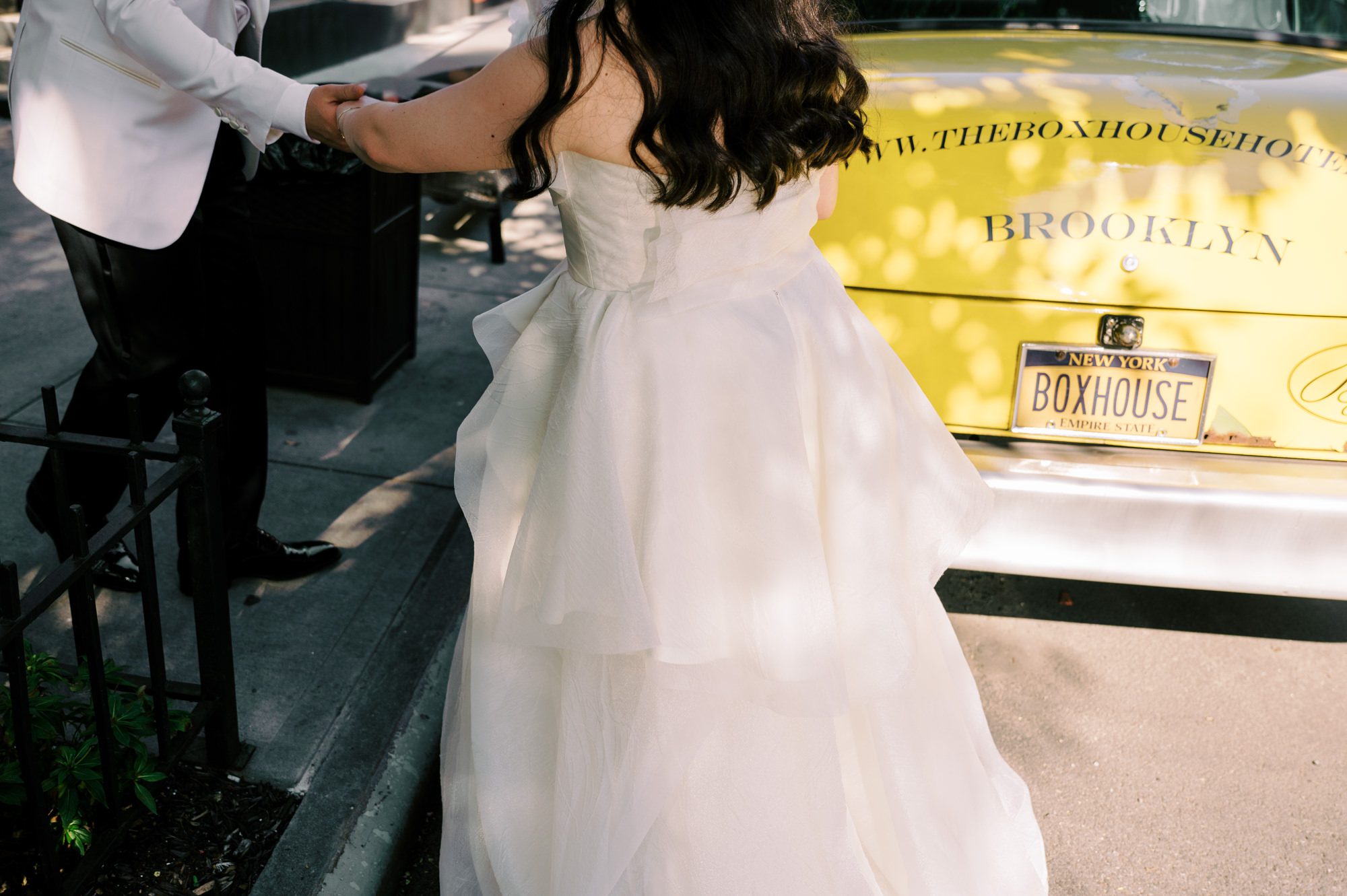 So excited for Erika and Andrei’s wedding day at The Box House Hotel in Brooklyn, NY. This boutique hotel had been on my bucket list for a while, and it did not disappoint! With its unique design, vibrant personality, and incredible rooftop views, The Box House Hotel provided the perfect setting for unique wedding celebration.
The day began with Erika and Andrei getting ready in their respective rooms, surrounded by friends and loved ones. One of the standout features of The Box House Hotel is its boutique charm and eclectic style, blending industrial elements with a cozy, artistic vibe. Erika’s bridal suite, with its floor-to-ceiling windows, was filled with natural light, making it a dream space for capturing those intimate getting-ready moments.
Once everyone was ready, Andrei headed to the rooftop, eagerly waiting to see his bride for the first time. As Erika gracefully approached, her dress swaying in the breeze, Andrei turned around, completely captivated. The two shared a private, heartfelt moment, whispering sweet words to each other, before we moved on to family photos.
The Box House Hotel’s location on a quiet Brooklyn street was perfect for photos. We captured their formal family and bridal party shots right in front of the hotel, showcasing its charming exterior. Then came a unique tradition I’d never witnessed before in my 14+ years of wedding photography! Erika and Andrei brought out a bucket of water filled with coins, and as guests cheered, Erika kicked the bucket as far as she could—a cultural ritual symbolizing good luck and prosperity. It was a joy to photograph and such a fun, memorable moment!
Afterward, we made our way back to the 10,000-square-foot rooftop, which offers unparalleled panoramic views of Manhattan, Brooklyn, and Long Island City. It’s a breathtaking setting for any wedding, leaving guests in awe of the skyline. Friends and family traveled from near and far, including Japan and Romania, to celebrate Erika and Andrei. To honor Erika's Japanese roots, Erika and Andrei incorporated a Japanese tea ceremony officiated by Erika's cousins from Japan. The rooftop was filled with laughter, love, and joy as the ceremony unfolded under the open sky.
As the sun set, the magic of the evening truly came alive. The city skyline twinkled with lights, and the dark sky sparkled with stars. Erika and Andrei danced, laughed, and celebrated late into the night, surrounded by their closest friends and family.
The Box House Hotel is a one-of-a-kind venue, blending urban sophistication with artistic charm. Its rooftop views, boutique-style accommodations, and vibrant atmosphere make it a perfect choice for couples looking to create a unique and unforgettable wedding experience.
Erika and Andrei, thank you for letting me be part of your incredible day. Wishing you a lifetime of love, happiness, and adventure!
Erika and Andrei The Box House Hotel Brooklyn NY Wedding documented by Karis from Hey Karis New York, Brooklyn, Hudson Valley NY and Catskills NY and NJ Wedding and NYC Elopement Photographer.