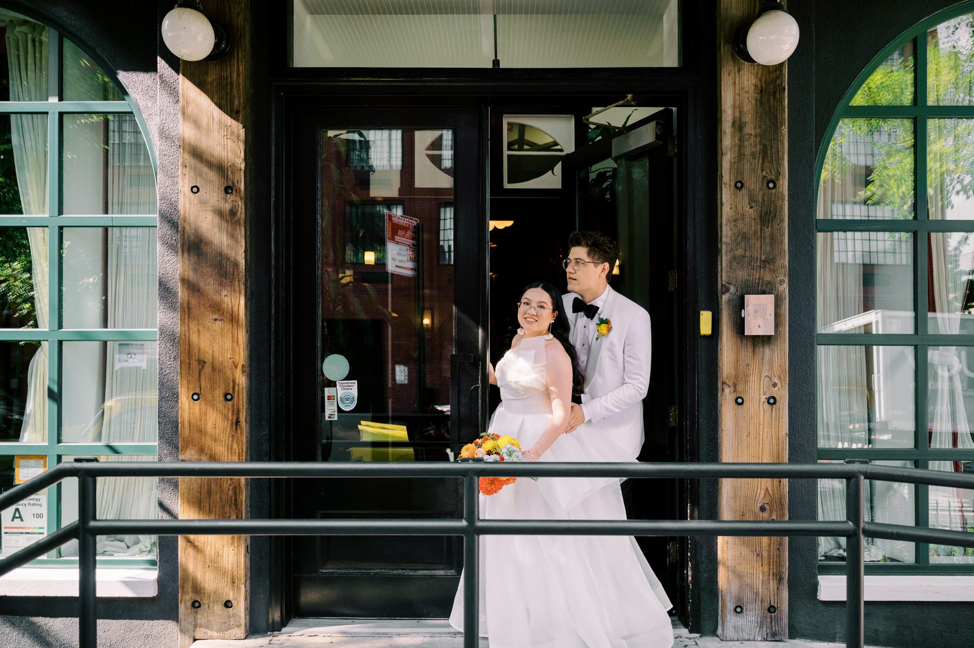 So excited for Erika and Andrei’s wedding day at The Box House Hotel in Brooklyn, NY. This boutique hotel had been on my bucket list for a while, and it did not disappoint! With its unique design, vibrant personality, and incredible rooftop views, The Box House Hotel provided the perfect setting for unique wedding celebration.
The day began with Erika and Andrei getting ready in their respective rooms, surrounded by friends and loved ones. One of the standout features of The Box House Hotel is its boutique charm and eclectic style, blending industrial elements with a cozy, artistic vibe. Erika’s bridal suite, with its floor-to-ceiling windows, was filled with natural light, making it a dream space for capturing those intimate getting-ready moments.
Once everyone was ready, Andrei headed to the rooftop, eagerly waiting to see his bride for the first time. As Erika gracefully approached, her dress swaying in the breeze, Andrei turned around, completely captivated. The two shared a private, heartfelt moment, whispering sweet words to each other, before we moved on to family photos.
The Box House Hotel’s location on a quiet Brooklyn street was perfect for photos. We captured their formal family and bridal party shots right in front of the hotel, showcasing its charming exterior. Then came a unique tradition I’d never witnessed before in my 14+ years of wedding photography! Erika and Andrei brought out a bucket of water filled with coins, and as guests cheered, Erika kicked the bucket as far as she could—a cultural ritual symbolizing good luck and prosperity. It was a joy to photograph and such a fun, memorable moment!
Afterward, we made our way back to the 10,000-square-foot rooftop, which offers unparalleled panoramic views of Manhattan, Brooklyn, and Long Island City. It’s a breathtaking setting for any wedding, leaving guests in awe of the skyline. Friends and family traveled from near and far, including Japan and Romania, to celebrate Erika and Andrei. To honor Erika's Japanese roots, Erika and Andrei incorporated a Japanese tea ceremony officiated by Erika's cousins from Japan. The rooftop was filled with laughter, love, and joy as the ceremony unfolded under the open sky.
As the sun set, the magic of the evening truly came alive. The city skyline twinkled with lights, and the dark sky sparkled with stars. Erika and Andrei danced, laughed, and celebrated late into the night, surrounded by their closest friends and family.
The Box House Hotel is a one-of-a-kind venue, blending urban sophistication with artistic charm. Its rooftop views, boutique-style accommodations, and vibrant atmosphere make it a perfect choice for couples looking to create a unique and unforgettable wedding experience.
Erika and Andrei, thank you for letting me be part of your incredible day. Wishing you a lifetime of love, happiness, and adventure!
Erika and Andrei The Box House Hotel Brooklyn NY Wedding documented by Karis from Hey Karis New York, Brooklyn, Hudson Valley NY and Catskills NY and NJ Wedding and NYC Elopement Photographer.