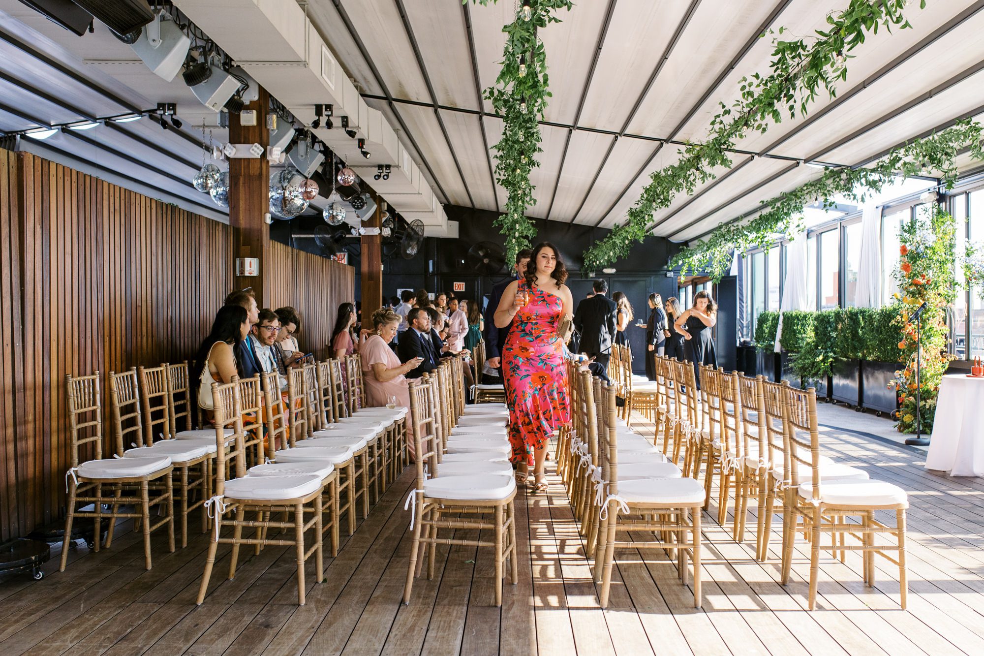 So excited for Erika and Andrei’s wedding day at The Box House Hotel in Brooklyn, NY. This boutique hotel had been on my bucket list for a while, and it did not disappoint! With its unique design, vibrant personality, and incredible rooftop views, The Box House Hotel provided the perfect setting for unique wedding celebration.
The day began with Erika and Andrei getting ready in their respective rooms, surrounded by friends and loved ones. One of the standout features of The Box House Hotel is its boutique charm and eclectic style, blending industrial elements with a cozy, artistic vibe. Erika’s bridal suite, with its floor-to-ceiling windows, was filled with natural light, making it a dream space for capturing those intimate getting-ready moments.
Once everyone was ready, Andrei headed to the rooftop, eagerly waiting to see his bride for the first time. As Erika gracefully approached, her dress swaying in the breeze, Andrei turned around, completely captivated. The two shared a private, heartfelt moment, whispering sweet words to each other, before we moved on to family photos.
The Box House Hotel’s location on a quiet Brooklyn street was perfect for photos. We captured their formal family and bridal party shots right in front of the hotel, showcasing its charming exterior. Then came a unique tradition I’d never witnessed before in my 14+ years of wedding photography! Erika and Andrei brought out a bucket of water filled with coins, and as guests cheered, Erika kicked the bucket as far as she could—a cultural ritual symbolizing good luck and prosperity. It was a joy to photograph and such a fun, memorable moment!
Afterward, we made our way back to the 10,000-square-foot rooftop, which offers unparalleled panoramic views of Manhattan, Brooklyn, and Long Island City. It’s a breathtaking setting for any wedding, leaving guests in awe of the skyline. Friends and family traveled from near and far, including Japan and Romania, to celebrate Erika and Andrei. To honor Erika's Japanese roots, Erika and Andrei incorporated a Japanese tea ceremony officiated by Erika's cousins from Japan. The rooftop was filled with laughter, love, and joy as the ceremony unfolded under the open sky.
As the sun set, the magic of the evening truly came alive. The city skyline twinkled with lights, and the dark sky sparkled with stars. Erika and Andrei danced, laughed, and celebrated late into the night, surrounded by their closest friends and family.
The Box House Hotel is a one-of-a-kind venue, blending urban sophistication with artistic charm. Its rooftop views, boutique-style accommodations, and vibrant atmosphere make it a perfect choice for couples looking to create a unique and unforgettable wedding experience.
Erika and Andrei, thank you for letting me be part of your incredible day. Wishing you a lifetime of love, happiness, and adventure!
Erika and Andrei The Box House Hotel Brooklyn NY Wedding documented by Karis from Hey Karis New York, Brooklyn, Hudson Valley NY and Catskills NY and NJ Wedding and NYC Elopement Photographer.