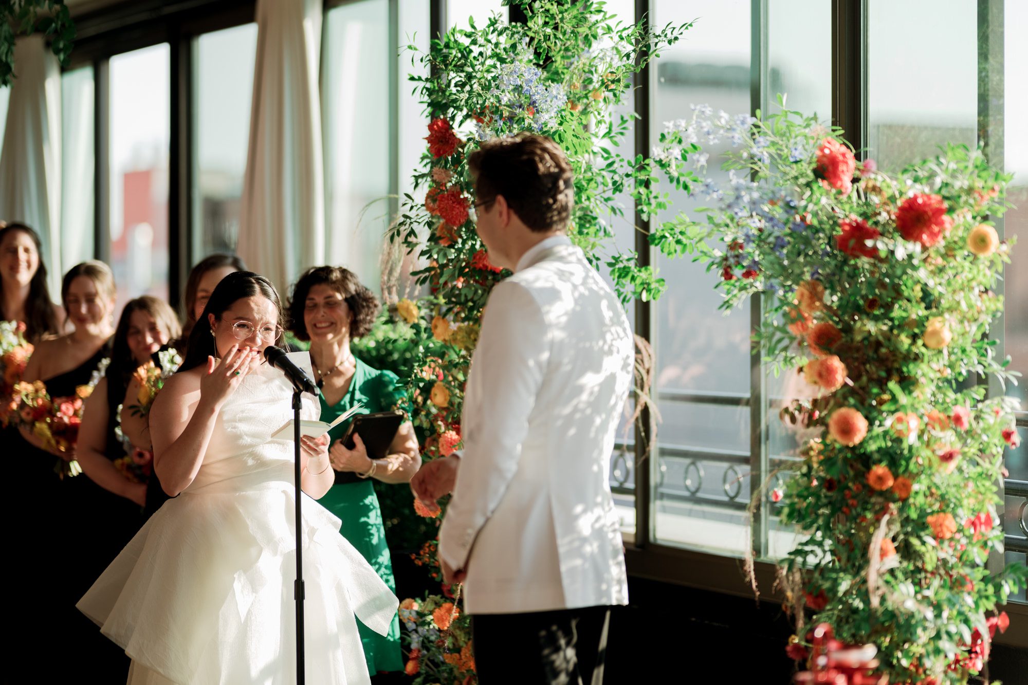 So excited for Erika and Andrei’s wedding day at The Box House Hotel in Brooklyn, NY. This boutique hotel had been on my bucket list for a while, and it did not disappoint! With its unique design, vibrant personality, and incredible rooftop views, The Box House Hotel provided the perfect setting for unique wedding celebration.
The day began with Erika and Andrei getting ready in their respective rooms, surrounded by friends and loved ones. One of the standout features of The Box House Hotel is its boutique charm and eclectic style, blending industrial elements with a cozy, artistic vibe. Erika’s bridal suite, with its floor-to-ceiling windows, was filled with natural light, making it a dream space for capturing those intimate getting-ready moments.
Once everyone was ready, Andrei headed to the rooftop, eagerly waiting to see his bride for the first time. As Erika gracefully approached, her dress swaying in the breeze, Andrei turned around, completely captivated. The two shared a private, heartfelt moment, whispering sweet words to each other, before we moved on to family photos.
The Box House Hotel’s location on a quiet Brooklyn street was perfect for photos. We captured their formal family and bridal party shots right in front of the hotel, showcasing its charming exterior. Then came a unique tradition I’d never witnessed before in my 14+ years of wedding photography! Erika and Andrei brought out a bucket of water filled with coins, and as guests cheered, Erika kicked the bucket as far as she could—a cultural ritual symbolizing good luck and prosperity. It was a joy to photograph and such a fun, memorable moment!
Afterward, we made our way back to the 10,000-square-foot rooftop, which offers unparalleled panoramic views of Manhattan, Brooklyn, and Long Island City. It’s a breathtaking setting for any wedding, leaving guests in awe of the skyline. Friends and family traveled from near and far, including Japan and Romania, to celebrate Erika and Andrei. To honor Erika's Japanese roots, Erika and Andrei incorporated a Japanese tea ceremony officiated by Erika's cousins from Japan. The rooftop was filled with laughter, love, and joy as the ceremony unfolded under the open sky.
As the sun set, the magic of the evening truly came alive. The city skyline twinkled with lights, and the dark sky sparkled with stars. Erika and Andrei danced, laughed, and celebrated late into the night, surrounded by their closest friends and family.
The Box House Hotel is a one-of-a-kind venue, blending urban sophistication with artistic charm. Its rooftop views, boutique-style accommodations, and vibrant atmosphere make it a perfect choice for couples looking to create a unique and unforgettable wedding experience.
Erika and Andrei, thank you for letting me be part of your incredible day. Wishing you a lifetime of love, happiness, and adventure!
Erika and Andrei The Box House Hotel Brooklyn NY Wedding documented by Karis from Hey Karis New York, Brooklyn, Hudson Valley NY and Catskills NY and NJ Wedding and NYC Elopement Photographer.