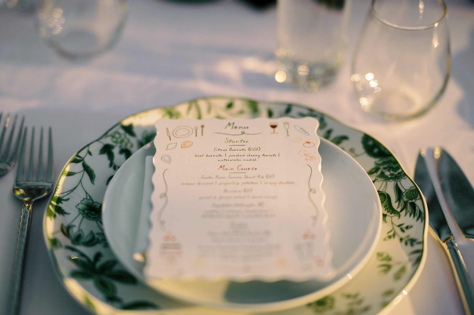 So excited for Erika and Andrei’s wedding day at The Box House Hotel in Brooklyn, NY. This boutique hotel had been on my bucket list for a while, and it did not disappoint! With its unique design, vibrant personality, and incredible rooftop views, The Box House Hotel provided the perfect setting for unique wedding celebration.
The day began with Erika and Andrei getting ready in their respective rooms, surrounded by friends and loved ones. One of the standout features of The Box House Hotel is its boutique charm and eclectic style, blending industrial elements with a cozy, artistic vibe. Erika’s bridal suite, with its floor-to-ceiling windows, was filled with natural light, making it a dream space for capturing those intimate getting-ready moments.
Once everyone was ready, Andrei headed to the rooftop, eagerly waiting to see his bride for the first time. As Erika gracefully approached, her dress swaying in the breeze, Andrei turned around, completely captivated. The two shared a private, heartfelt moment, whispering sweet words to each other, before we moved on to family photos.
The Box House Hotel’s location on a quiet Brooklyn street was perfect for photos. We captured their formal family and bridal party shots right in front of the hotel, showcasing its charming exterior. Then came a unique tradition I’d never witnessed before in my 14+ years of wedding photography! Erika and Andrei brought out a bucket of water filled with coins, and as guests cheered, Erika kicked the bucket as far as she could—a cultural ritual symbolizing good luck and prosperity. It was a joy to photograph and such a fun, memorable moment!
Afterward, we made our way back to the 10,000-square-foot rooftop, which offers unparalleled panoramic views of Manhattan, Brooklyn, and Long Island City. It’s a breathtaking setting for any wedding, leaving guests in awe of the skyline. Friends and family traveled from near and far, including Japan and Romania, to celebrate Erika and Andrei. To honor Erika's Japanese roots, Erika and Andrei incorporated a Japanese tea ceremony officiated by Erika's cousins from Japan. The rooftop was filled with laughter, love, and joy as the ceremony unfolded under the open sky.
As the sun set, the magic of the evening truly came alive. The city skyline twinkled with lights, and the dark sky sparkled with stars. Erika and Andrei danced, laughed, and celebrated late into the night, surrounded by their closest friends and family.
The Box House Hotel is a one-of-a-kind venue, blending urban sophistication with artistic charm. Its rooftop views, boutique-style accommodations, and vibrant atmosphere make it a perfect choice for couples looking to create a unique and unforgettable wedding experience.
Erika and Andrei, thank you for letting me be part of your incredible day. Wishing you a lifetime of love, happiness, and adventure!
Erika and Andrei The Box House Hotel Brooklyn NY Wedding documented by Karis from Hey Karis New York, Brooklyn, Hudson Valley NY and Catskills NY and NJ Wedding and NYC Elopement Photographer.