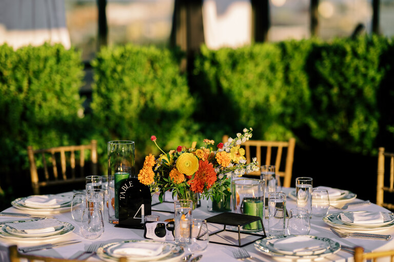 So excited for Erika and Andrei’s wedding day at The Box House Hotel in Brooklyn, NY. This boutique hotel had been on my bucket list for a while, and it did not disappoint! With its unique design, vibrant personality, and incredible rooftop views, The Box House Hotel provided the perfect setting for unique wedding celebration.
The day began with Erika and Andrei getting ready in their respective rooms, surrounded by friends and loved ones. One of the standout features of The Box House Hotel is its boutique charm and eclectic style, blending industrial elements with a cozy, artistic vibe. Erika’s bridal suite, with its floor-to-ceiling windows, was filled with natural light, making it a dream space for capturing those intimate getting-ready moments.
Once everyone was ready, Andrei headed to the rooftop, eagerly waiting to see his bride for the first time. As Erika gracefully approached, her dress swaying in the breeze, Andrei turned around, completely captivated. The two shared a private, heartfelt moment, whispering sweet words to each other, before we moved on to family photos.
The Box House Hotel’s location on a quiet Brooklyn street was perfect for photos. We captured their formal family and bridal party shots right in front of the hotel, showcasing its charming exterior. Then came a unique tradition I’d never witnessed before in my 14+ years of wedding photography! Erika and Andrei brought out a bucket of water filled with coins, and as guests cheered, Erika kicked the bucket as far as she could—a cultural ritual symbolizing good luck and prosperity. It was a joy to photograph and such a fun, memorable moment!
Afterward, we made our way back to the 10,000-square-foot rooftop, which offers unparalleled panoramic views of Manhattan, Brooklyn, and Long Island City. It’s a breathtaking setting for any wedding, leaving guests in awe of the skyline. Friends and family traveled from near and far, including Japan and Romania, to celebrate Erika and Andrei. To honor Erika's Japanese roots, Erika and Andrei incorporated a Japanese tea ceremony officiated by Erika's cousins from Japan. The rooftop was filled with laughter, love, and joy as the ceremony unfolded under the open sky.
As the sun set, the magic of the evening truly came alive. The city skyline twinkled with lights, and the dark sky sparkled with stars. Erika and Andrei danced, laughed, and celebrated late into the night, surrounded by their closest friends and family.
The Box House Hotel is a one-of-a-kind venue, blending urban sophistication with artistic charm. Its rooftop views, boutique-style accommodations, and vibrant atmosphere make it a perfect choice for couples looking to create a unique and unforgettable wedding experience.
Erika and Andrei, thank you for letting me be part of your incredible day. Wishing you a lifetime of love, happiness, and adventure!
Erika and Andrei The Box House Hotel Brooklyn NY Wedding documented by Karis from Hey Karis New York, Brooklyn, Hudson Valley NY and Catskills NY and NJ Wedding and NYC Elopement Photographer.