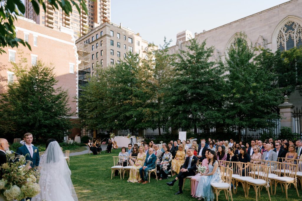 Gorgeous September Wedding at Cooper Hewitt, Smithsonian Design Museum in Manhattan, NY
The breathtaking lawn at the Cooper Hewitt was adorned with a stunning tent and lush greenery. Matching tablecloths and elegant dinnerware were set beneath the tent, creating a sophisticated ambiance. The garden was transformed into a beautiful ceremony space in the heart of Manhattan. Surrounded by towering buildings, it felt almost surreal—a peaceful oasis in the city.
The clinking of champagne glasses and trays of hors d'oeuvres added to the joyous atmosphere as guests savored every moment of the cocktail hour. When the sky darkened, guests moved under the tent for the reception. As night fell, the glow of the candles became warmer and brighter, creating an enchanting setting. The sound of lively conversation and laughter filled the Manhattan air.
Dancing took place inside the historic Cooper Hewitt mansion, where the live band, On The Move Events, delivered an unforgettable performance. Guests enthusiastically filled the dance floor, ending the evening on a high note of celebration and joy.
Thankful for all the wedding vendors that made this day possible:
Planner: @aniwolff_⁠
Venue: @cooperhewitt
Catering: @thomaspretieventstosavor
Tent: @stamford_tent
Lighting: @frostproductionsnyc⁠
Rentals: @sdpr_rentals⁠
Linens: @nuagedesignsinc⁠
Photographer: @heykaris
Videographer: @katiarepinafilms⁠
Florist: @sarahsaundersstudio
Entertainment: @onthemoveevents⁠
Cake: @luckybirdcakes⁠
Officiant: @ourweddingofficiantnyc⁠
Ceremony Strings: @impulsestrings⁠
Stationery: @jensimpsondesign⁠
Favors: @swmsweets
Cooper Hewitt Smithsonian Design Museum Manhattan NY Wedding documented by Karis from Hey Karis New York, Brooklyn, Hudson Valley NY and Catskills NY and NJ Wedding and NYC Elopement Photographer.