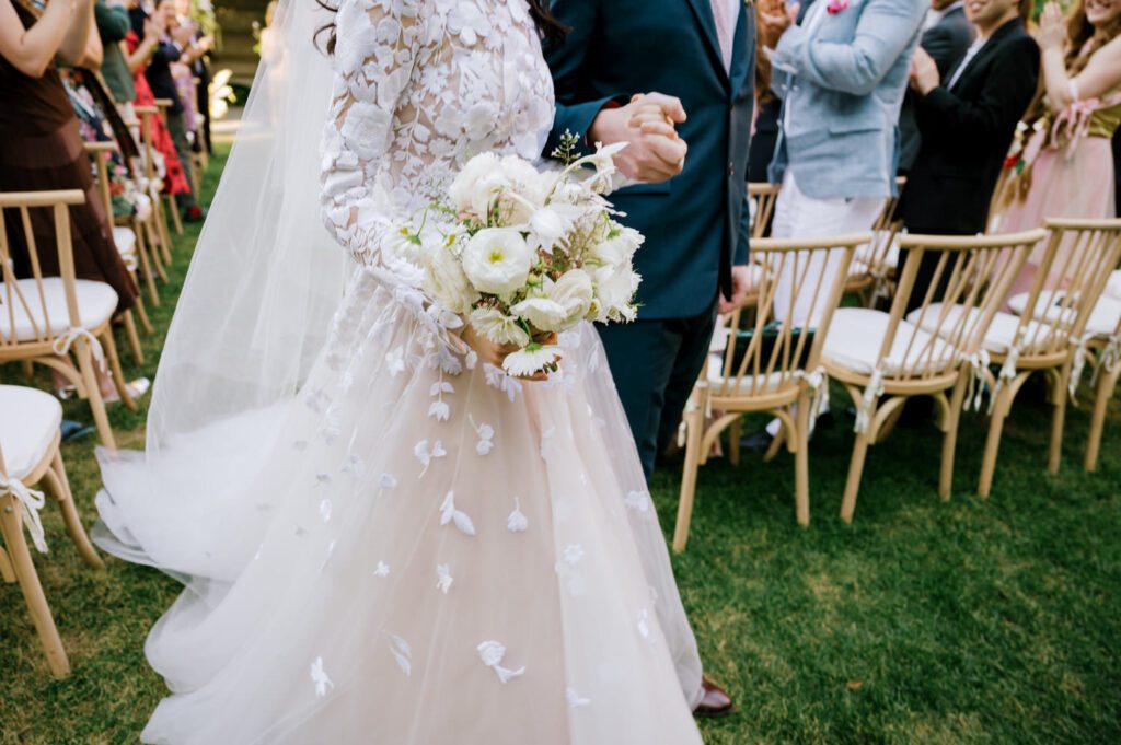 Gorgeous September Wedding at Cooper Hewitt, Smithsonian Design Museum in Manhattan, NY
The breathtaking lawn at the Cooper Hewitt was adorned with a stunning tent and lush greenery. Matching tablecloths and elegant dinnerware were set beneath the tent, creating a sophisticated ambiance. The garden was transformed into a beautiful ceremony space in the heart of Manhattan. Surrounded by towering buildings, it felt almost surreal—a peaceful oasis in the city.
The clinking of champagne glasses and trays of hors d'oeuvres added to the joyous atmosphere as guests savored every moment of the cocktail hour. When the sky darkened, guests moved under the tent for the reception. As night fell, the glow of the candles became warmer and brighter, creating an enchanting setting. The sound of lively conversation and laughter filled the Manhattan air.
Dancing took place inside the historic Cooper Hewitt mansion, where the live band, On The Move Events, delivered an unforgettable performance. Guests enthusiastically filled the dance floor, ending the evening on a high note of celebration and joy.
Thankful for all the wedding vendors that made this day possible:
Planner: @aniwolff_⁠
Venue: @cooperhewitt
Catering: @thomaspretieventstosavor
Tent: @stamford_tent
Lighting: @frostproductionsnyc⁠
Rentals: @sdpr_rentals⁠
Linens: @nuagedesignsinc⁠
Photographer: @heykaris
Videographer: @katiarepinafilms⁠
Florist: @sarahsaundersstudio
Entertainment: @onthemoveevents⁠
Cake: @luckybirdcakes⁠
Officiant: @ourweddingofficiantnyc⁠
Ceremony Strings: @impulsestrings⁠
Stationery: @jensimpsondesign⁠
Favors: @swmsweets
Cooper Hewitt Smithsonian Design Museum Manhattan NY Wedding documented by Karis from Hey Karis New York, Brooklyn, Hudson Valley NY and Catskills NY and NJ Wedding and NYC Elopement Photographer.