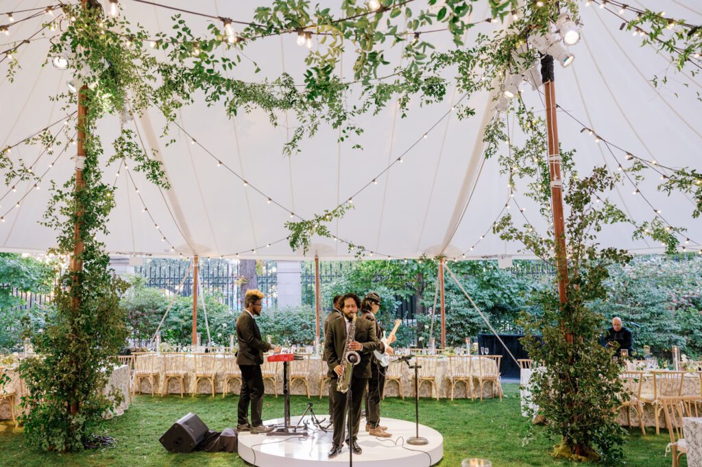 Gorgeous September Wedding at Cooper Hewitt, Smithsonian Design Museum in Manhattan, NY
The breathtaking lawn at the Cooper Hewitt was adorned with a stunning tent and lush greenery. Matching tablecloths and elegant dinnerware were set beneath the tent, creating a sophisticated ambiance. The garden was transformed into a beautiful ceremony space in the heart of Manhattan. Surrounded by towering buildings, it felt almost surreal—a peaceful oasis in the city.
The clinking of champagne glasses and trays of hors d'oeuvres added to the joyous atmosphere as guests savored every moment of the cocktail hour. When the sky darkened, guests moved under the tent for the reception. As night fell, the glow of the candles became warmer and brighter, creating an enchanting setting. The sound of lively conversation and laughter filled the Manhattan air.
Dancing took place inside the historic Cooper Hewitt mansion, where the live band, On The Move Events, delivered an unforgettable performance. Guests enthusiastically filled the dance floor, ending the evening on a high note of celebration and joy.
Thankful for all the wedding vendors that made this day possible:
Planner: @aniwolff_⁠
Venue: @cooperhewitt
Catering: @thomaspretieventstosavor
Tent: @stamford_tent
Lighting: @frostproductionsnyc⁠
Rentals: @sdpr_rentals⁠
Linens: @nuagedesignsinc⁠
Photographer: @heykaris
Videographer: @katiarepinafilms⁠
Florist: @sarahsaundersstudio
Entertainment: @onthemoveevents⁠
Cake: @luckybirdcakes⁠
Officiant: @ourweddingofficiantnyc⁠
Ceremony Strings: @impulsestrings⁠
Stationery: @jensimpsondesign⁠
Favors: @swmsweets
Cooper Hewitt Smithsonian Design Museum Manhattan NY Wedding documented by Karis from Hey Karis New York, Brooklyn, Hudson Valley NY and Catskills NY and NJ Wedding and NYC Elopement Photographer.