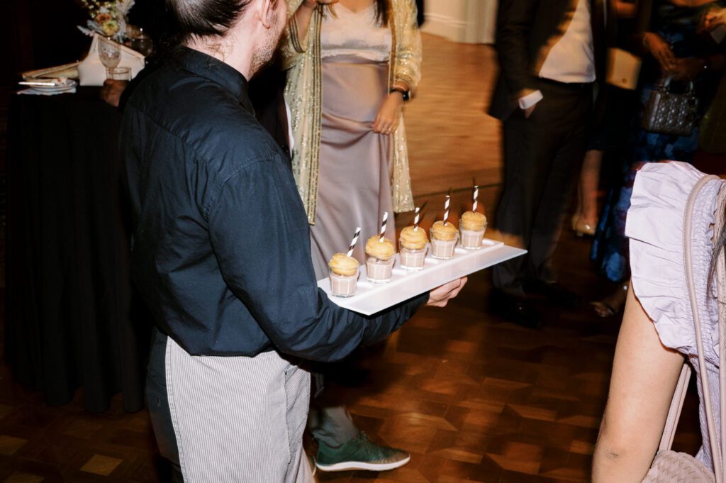 Gorgeous September Wedding at Cooper Hewitt, Smithsonian Design Museum in Manhattan, NY
The breathtaking lawn at the Cooper Hewitt was adorned with a stunning tent and lush greenery. Matching tablecloths and elegant dinnerware were set beneath the tent, creating a sophisticated ambiance. The garden was transformed into a beautiful ceremony space in the heart of Manhattan. Surrounded by towering buildings, it felt almost surreal—a peaceful oasis in the city.
The clinking of champagne glasses and trays of hors d'oeuvres added to the joyous atmosphere as guests savored every moment of the cocktail hour. When the sky darkened, guests moved under the tent for the reception. As night fell, the glow of the candles became warmer and brighter, creating an enchanting setting. The sound of lively conversation and laughter filled the Manhattan air.
Dancing took place inside the historic Cooper Hewitt mansion, where the live band, On The Move Events, delivered an unforgettable performance. Guests enthusiastically filled the dance floor, ending the evening on a high note of celebration and joy.
Thankful for all the wedding vendors that made this day possible:
Planner: @aniwolff_⁠
Venue: @cooperhewitt
Catering: @thomaspretieventstosavor
Tent: @stamford_tent
Lighting: @frostproductionsnyc⁠
Rentals: @sdpr_rentals⁠
Linens: @nuagedesignsinc⁠
Photographer: @heykaris
Videographer: @katiarepinafilms⁠
Florist: @sarahsaundersstudio
Entertainment: @onthemoveevents⁠
Cake: @luckybirdcakes⁠
Officiant: @ourweddingofficiantnyc⁠
Ceremony Strings: @impulsestrings⁠
Stationery: @jensimpsondesign⁠
Favors: @swmsweets
Cooper Hewitt Smithsonian Design Museum Manhattan NY Wedding documented by Karis from Hey Karis New York, Brooklyn, Hudson Valley NY and Catskills NY and NJ Wedding and NYC Elopement Photographer.