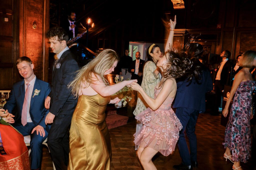 Gorgeous September Wedding at Cooper Hewitt, Smithsonian Design Museum in Manhattan, NY
The breathtaking lawn at the Cooper Hewitt was adorned with a stunning tent and lush greenery. Matching tablecloths and elegant dinnerware were set beneath the tent, creating a sophisticated ambiance. The garden was transformed into a beautiful ceremony space in the heart of Manhattan. Surrounded by towering buildings, it felt almost surreal—a peaceful oasis in the city.
The clinking of champagne glasses and trays of hors d'oeuvres added to the joyous atmosphere as guests savored every moment of the cocktail hour. When the sky darkened, guests moved under the tent for the reception. As night fell, the glow of the candles became warmer and brighter, creating an enchanting setting. The sound of lively conversation and laughter filled the Manhattan air.
Dancing took place inside the historic Cooper Hewitt mansion, where the live band, On The Move Events, delivered an unforgettable performance. Guests enthusiastically filled the dance floor, ending the evening on a high note of celebration and joy.
Thankful for all the wedding vendors that made this day possible:
Planner: @aniwolff_⁠
Venue: @cooperhewitt
Catering: @thomaspretieventstosavor
Tent: @stamford_tent
Lighting: @frostproductionsnyc⁠
Rentals: @sdpr_rentals⁠
Linens: @nuagedesignsinc⁠
Photographer: @heykaris
Videographer: @katiarepinafilms⁠
Florist: @sarahsaundersstudio
Entertainment: @onthemoveevents⁠
Cake: @luckybirdcakes⁠
Officiant: @ourweddingofficiantnyc⁠
Ceremony Strings: @impulsestrings⁠
Stationery: @jensimpsondesign⁠
Favors: @swmsweets
Cooper Hewitt Smithsonian Design Museum Manhattan NY Wedding documented by Karis from Hey Karis New York, Brooklyn, Hudson Valley NY and Catskills NY and NJ Wedding and NYC Elopement Photographer.