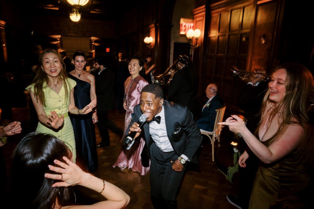 Gorgeous September Wedding at Cooper Hewitt, Smithsonian Design Museum in Manhattan, NY
The breathtaking lawn at the Cooper Hewitt was adorned with a stunning tent and lush greenery. Matching tablecloths and elegant dinnerware were set beneath the tent, creating a sophisticated ambiance. The garden was transformed into a beautiful ceremony space in the heart of Manhattan. Surrounded by towering buildings, it felt almost surreal—a peaceful oasis in the city.
The clinking of champagne glasses and trays of hors d'oeuvres added to the joyous atmosphere as guests savored every moment of the cocktail hour. When the sky darkened, guests moved under the tent for the reception. As night fell, the glow of the candles became warmer and brighter, creating an enchanting setting. The sound of lively conversation and laughter filled the Manhattan air.
Dancing took place inside the historic Cooper Hewitt mansion, where the live band, On The Move Events, delivered an unforgettable performance. Guests enthusiastically filled the dance floor, ending the evening on a high note of celebration and joy.
Cooper Hewitt Smithsonian Design Museum Manhattan NY Wedding documented by Karis from Hey Karis New York, Brooklyn, Hudson Valley NY and Catskills NY and NJ Wedding and NYC Elopement Photographer.
