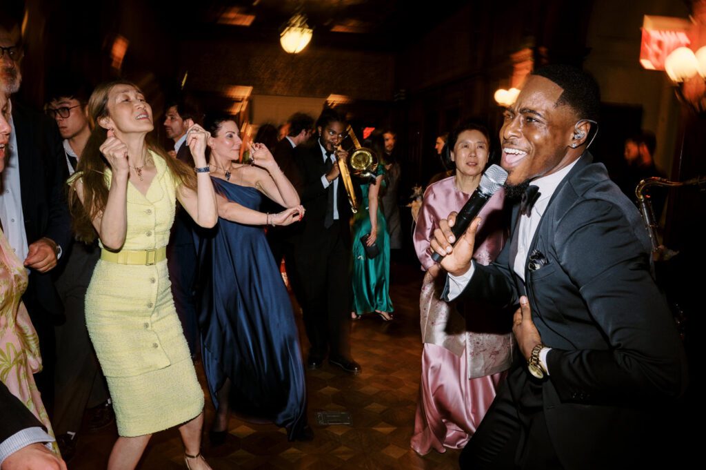 Gorgeous September Wedding at Cooper Hewitt, Smithsonian Design Museum in Manhattan, NY
The breathtaking lawn at the Cooper Hewitt was adorned with a stunning tent and lush greenery. Matching tablecloths and elegant dinnerware were set beneath the tent, creating a sophisticated ambiance. The garden was transformed into a beautiful ceremony space in the heart of Manhattan. Surrounded by towering buildings, it felt almost surreal—a peaceful oasis in the city.
The clinking of champagne glasses and trays of hors d'oeuvres added to the joyous atmosphere as guests savored every moment of the cocktail hour. When the sky darkened, guests moved under the tent for the reception. As night fell, the glow of the candles became warmer and brighter, creating an enchanting setting. The sound of lively conversation and laughter filled the Manhattan air.
Dancing took place inside the historic Cooper Hewitt mansion, where the live band, On The Move Events, delivered an unforgettable performance. Guests enthusiastically filled the dance floor, ending the evening on a high note of celebration and joy.
Cooper Hewitt Smithsonian Design Museum Manhattan NY Wedding documented by Karis from Hey Karis New York, Brooklyn, Hudson Valley NY and Catskills NY and NJ Wedding and NYC Elopement Photographer.