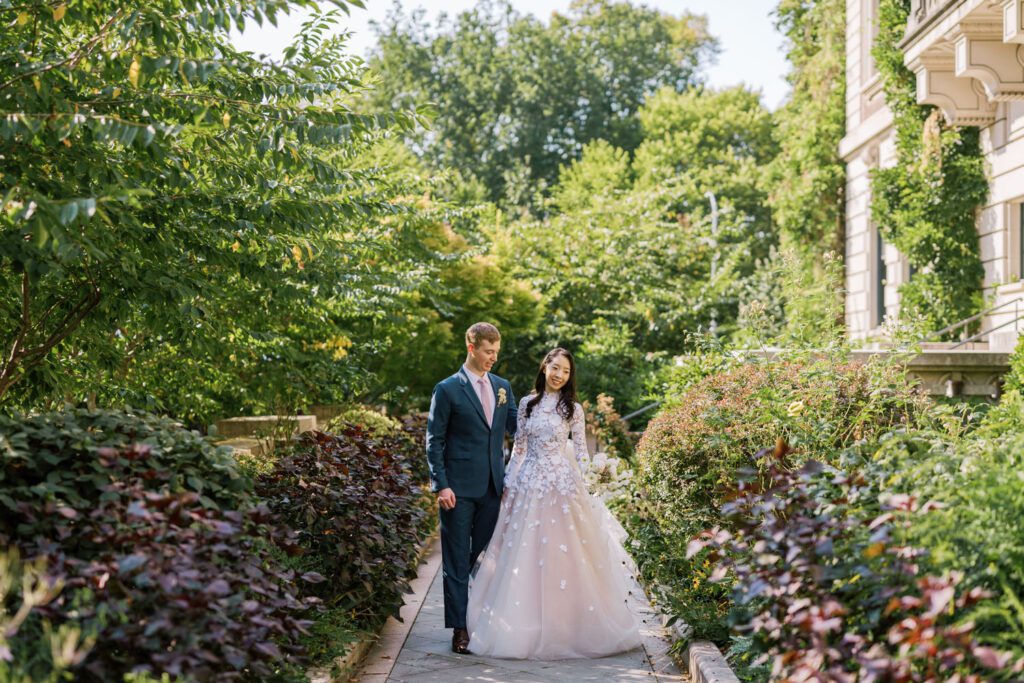 Gorgeous September Wedding at Cooper Hewitt, Smithsonian Design Museum in Manhattan, NY
The breathtaking lawn at the Cooper Hewitt was adorned with a stunning tent and lush greenery. Matching tablecloths and elegant dinnerware were set beneath the tent, creating a sophisticated ambiance. The garden was transformed into a beautiful ceremony space in the heart of Manhattan. Surrounded by towering buildings, it felt almost surreal—a peaceful oasis in the city.
The clinking of champagne glasses and trays of hors d'oeuvres added to the joyous atmosphere as guests savored every moment of the cocktail hour. When the sky darkened, guests moved under the tent for the reception. As night fell, the glow of the candles became warmer and brighter, creating an enchanting setting. The sound of lively conversation and laughter filled the Manhattan air.
Dancing took place inside the historic Cooper Hewitt mansion, where the live band, On The Move Events, delivered an unforgettable performance. Guests enthusiastically filled the dance floor, ending the evening on a high note of celebration and joy.
Thankful for all the wedding vendors that made this day possible:
Planner: @aniwolff_⁠
Venue: @cooperhewitt
Catering: @thomaspretieventstosavor
Tent: @stamford_tent
Lighting: @frostproductionsnyc⁠
Rentals: @sdpr_rentals⁠
Linens: @nuagedesignsinc⁠
Photographer: @heykaris
Videographer: @katiarepinafilms⁠
Florist: @sarahsaundersstudio
Entertainment: @onthemoveevents⁠
Cake: @luckybirdcakes⁠
Officiant: @ourweddingofficiantnyc⁠
Ceremony Strings: @impulsestrings⁠
Stationery: @jensimpsondesign⁠
Favors: @swmsweets
Cooper Hewitt Smithsonian Design Museum Manhattan NY Wedding documented by Karis from Hey Karis New York, Brooklyn, Hudson Valley NY and Catskills NY and NJ Wedding and NYC Elopement Photographer.