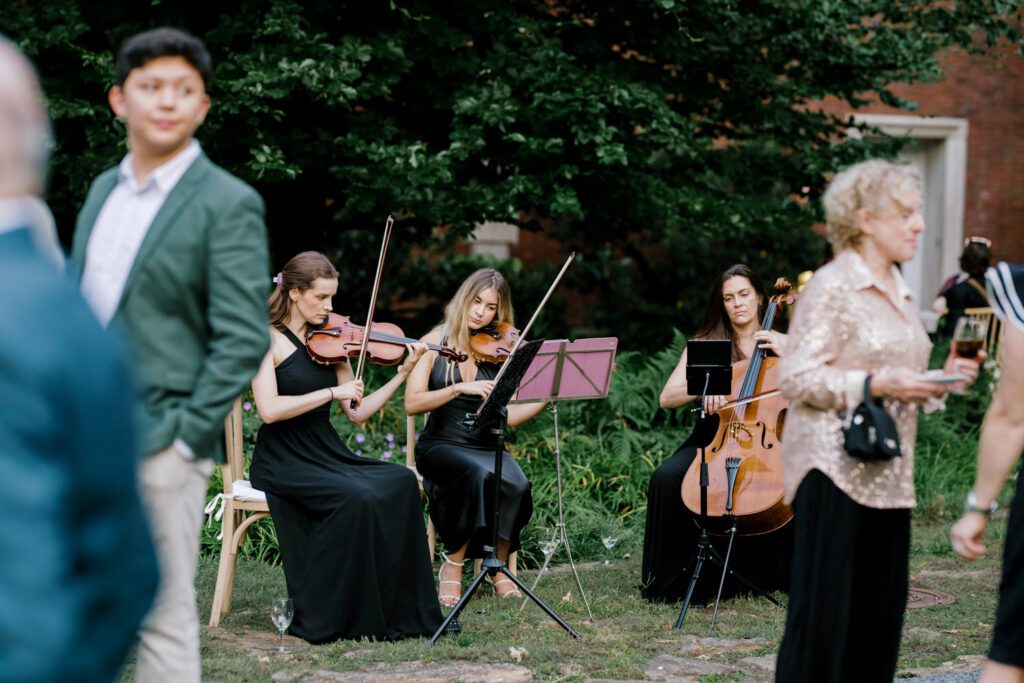 Gorgeous September Wedding at Cooper Hewitt, Smithsonian Design Museum in Manhattan, NY
The breathtaking lawn at the Cooper Hewitt was adorned with a stunning tent and lush greenery. Matching tablecloths and elegant dinnerware were set beneath the tent, creating a sophisticated ambiance. The garden was transformed into a beautiful ceremony space in the heart of Manhattan. Surrounded by towering buildings, it felt almost surreal—a peaceful oasis in the city.
The clinking of champagne glasses and trays of hors d'oeuvres added to the joyous atmosphere as guests savored every moment of the cocktail hour. When the sky darkened, guests moved under the tent for the reception. As night fell, the glow of the candles became warmer and brighter, creating an enchanting setting. The sound of lively conversation and laughter filled the Manhattan air.
Dancing took place inside the historic Cooper Hewitt mansion, where the live band, On The Move Events, delivered an unforgettable performance. Guests enthusiastically filled the dance floor, ending the evening on a high note of celebration and joy.
Thankful for all the wedding vendors that made this day possible:
Planner: @aniwolff_⁠
Venue: @cooperhewitt
Catering: @thomaspretieventstosavor
Tent: @stamford_tent
Lighting: @frostproductionsnyc⁠
Rentals: @sdpr_rentals⁠
Linens: @nuagedesignsinc⁠
Photographer: @heykaris
Videographer: @katiarepinafilms⁠
Florist: @sarahsaundersstudio
Entertainment: @onthemoveevents⁠
Cake: @luckybirdcakes⁠
Officiant: @ourweddingofficiantnyc⁠
Ceremony Strings: @impulsestrings⁠
Stationery: @jensimpsondesign⁠
Favors: @swmsweets
Cooper Hewitt Smithsonian Design Museum Manhattan NY Wedding documented by Karis from Hey Karis New York, Brooklyn, Hudson Valley NY and Catskills NY and NJ Wedding and NYC Elopement Photographer.