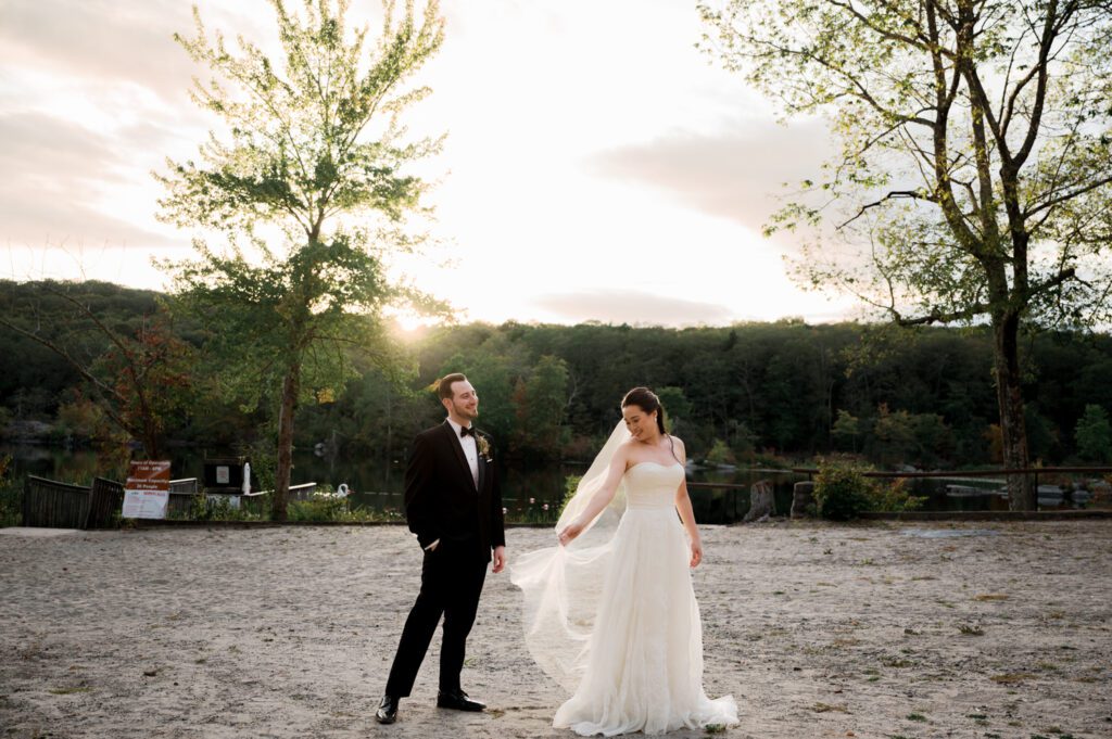 Vivian and Josh’s Gorgeous September Wedding at Arrow Park, NY
There’s something truly special about Arrow Park—it feels like my home away from home, and Vivian and Josh’s beautiful September wedding perfectly showcased everything this venue has to offer. Their blended celebration, honoring Vivian’s Korean heritage and Josh’s Jewish background, was a heartfelt and unforgettable day.
The couple beautifully wove their cultures into the festivities, from breaking the glass at the end of their garden ceremony to the lively horah during the reception. Later, Vivian and Josh delighted their guests by changing into traditional Korean hanbok outfits, a touching nod to her heritage.
Arrow Park: A Dream Venue for Multi-Day WeddingsVivian, Josh, and their loved ones all got ready at Arrow Park, which offers plenty of spacious accommodations for family and friends. This made it the perfect choice for their multi-day celebration. With its stunning grounds and versatile spaces, Arrow Park is ideal for couples seeking a wedding weekend filled with both elegance and comfort.
A Scenic September CelebrationThanks to the pleasant September weather, Vivian and Josh made full use of Arrow Park’s breathtaking grounds. Their day began with a magical first look along the iconic driveway lined with towering trees. From there, we explored the garden with its charming sculptures, captured moments by the ceremony’s floral décor, and took stunning portraits on the mansion’s iconic back staircase bathed in perfect lighting. We also ventured indoors for photos in the library and the Green Room, taking advantage of the mansion’s timeless charm.
As family and friends gathered, we captured formal portraits in front of the grand mansion before the ceremony began.
A Ceremony and Reception to RememberThe ceremony was set in the picturesque garden, where Jenny from Field Trip Flowers created a breathtaking floral backdrop that perfectly complemented the natural beauty of Arrow Park.
Afterward, guests strolled back to the mansion for a warm and inviting cocktail hour on the main floor. Later, everyone gathered in the courtyard for an enchanting outdoor reception under twinkling café lights. The space felt intimate yet grand, with the perfect blend of rustic elegance and romance.
Arrow Park’s charm, coupled with Vivian and Josh’s thoughtful cultural details, made this wedding one to remember. It’s the kind of venue where dreams come true—a hidden gem that’s ready to host your perfect day.
  
Thankful for all the wedding vendors that made this day possible:⁠
Venue: @arrowparkny
Floral: @fieldtripflowers

Vivian and Josh Arrow Park NY Wedding documented by Karis from Hey Karis New York, Brooklyn, Hudson Valley NY and Catskills NY and NJ Wedding and NYC Elopement Photographer.