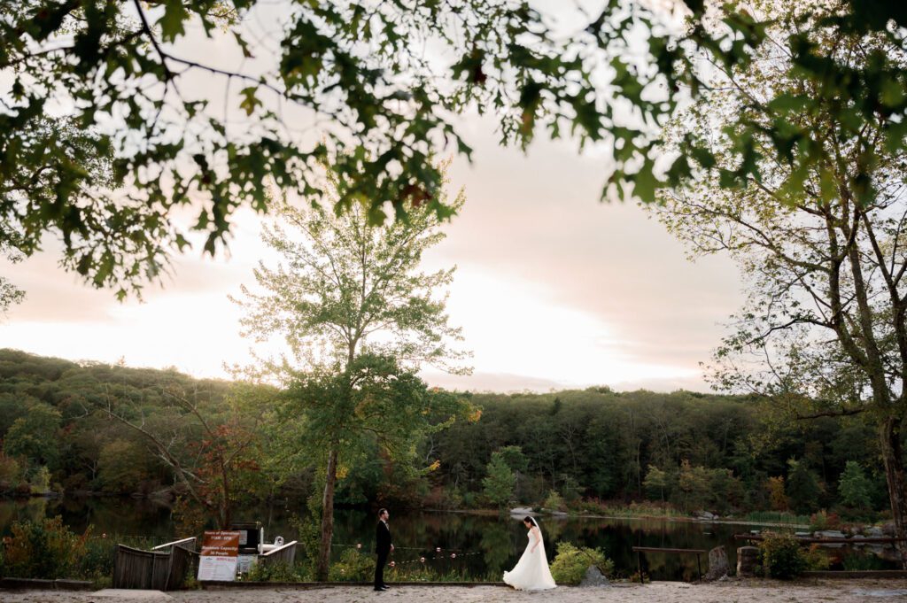 Vivian and Josh’s Gorgeous September Wedding at Arrow Park, NY
There’s something truly special about Arrow Park—it feels like my home away from home, and Vivian and Josh’s beautiful September wedding perfectly showcased everything this venue has to offer. Their blended celebration, honoring Vivian’s Korean heritage and Josh’s Jewish background, was a heartfelt and unforgettable day.
The couple beautifully wove their cultures into the festivities, from breaking the glass at the end of their garden ceremony to the lively horah during the reception. Later, Vivian and Josh delighted their guests by changing into traditional Korean hanbok outfits, a touching nod to her heritage.
Arrow Park: A Dream Venue for Multi-Day WeddingsVivian, Josh, and their loved ones all got ready at Arrow Park, which offers plenty of spacious accommodations for family and friends. This made it the perfect choice for their multi-day celebration. With its stunning grounds and versatile spaces, Arrow Park is ideal for couples seeking a wedding weekend filled with both elegance and comfort.
A Scenic September CelebrationThanks to the pleasant September weather, Vivian and Josh made full use of Arrow Park’s breathtaking grounds. Their day began with a magical first look along the iconic driveway lined with towering trees. From there, we explored the garden with its charming sculptures, captured moments by the ceremony’s floral décor, and took stunning portraits on the mansion’s iconic back staircase bathed in perfect lighting. We also ventured indoors for photos in the library and the Green Room, taking advantage of the mansion’s timeless charm.
As family and friends gathered, we captured formal portraits in front of the grand mansion before the ceremony began.
A Ceremony and Reception to RememberThe ceremony was set in the picturesque garden, where Jenny from Field Trip Flowers created a breathtaking floral backdrop that perfectly complemented the natural beauty of Arrow Park.
Afterward, guests strolled back to the mansion for a warm and inviting cocktail hour on the main floor. Later, everyone gathered in the courtyard for an enchanting outdoor reception under twinkling café lights. The space felt intimate yet grand, with the perfect blend of rustic elegance and romance.
Arrow Park’s charm, coupled with Vivian and Josh’s thoughtful cultural details, made this wedding one to remember. It’s the kind of venue where dreams come true—a hidden gem that’s ready to host your perfect day.
  
Thankful for all the wedding vendors that made this day possible:⁠
Venue: @arrowparkny
Floral: @fieldtripflowers

Vivian and Josh Arrow Park NY Wedding documented by Karis from Hey Karis New York, Brooklyn, Hudson Valley NY and Catskills NY and NJ Wedding and NYC Elopement Photographer.