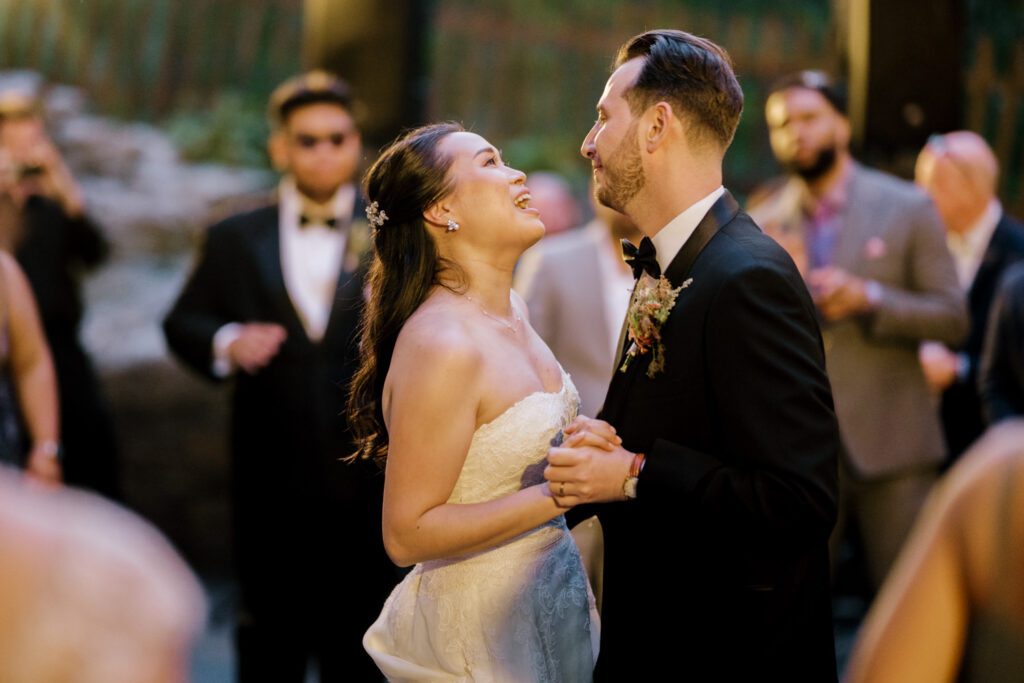 Vivian and Josh’s Gorgeous September Wedding at Arrow Park, NY
There’s something truly special about Arrow Park—it feels like my home away from home, and Vivian and Josh’s beautiful September wedding perfectly showcased everything this venue has to offer. Their blended celebration, honoring Vivian’s Korean heritage and Josh’s Jewish background, was a heartfelt and unforgettable day.
The couple beautifully wove their cultures into the festivities, from breaking the glass at the end of their garden ceremony to the lively horah during the reception. Later, Vivian and Josh delighted their guests by changing into traditional Korean hanbok outfits, a touching nod to her heritage.
Arrow Park: A Dream Venue for Multi-Day WeddingsVivian, Josh, and their loved ones all got ready at Arrow Park, which offers plenty of spacious accommodations for family and friends. This made it the perfect choice for their multi-day celebration. With its stunning grounds and versatile spaces, Arrow Park is ideal for couples seeking a wedding weekend filled with both elegance and comfort.
A Scenic September CelebrationThanks to the pleasant September weather, Vivian and Josh made full use of Arrow Park’s breathtaking grounds. Their day began with a magical first look along the iconic driveway lined with towering trees. From there, we explored the garden with its charming sculptures, captured moments by the ceremony’s floral décor, and took stunning portraits on the mansion’s iconic back staircase bathed in perfect lighting. We also ventured indoors for photos in the library and the Green Room, taking advantage of the mansion’s timeless charm.
As family and friends gathered, we captured formal portraits in front of the grand mansion before the ceremony began.
A Ceremony and Reception to RememberThe ceremony was set in the picturesque garden, where Jenny from Field Trip Flowers created a breathtaking floral backdrop that perfectly complemented the natural beauty of Arrow Park.
Afterward, guests strolled back to the mansion for a warm and inviting cocktail hour on the main floor. Later, everyone gathered in the courtyard for an enchanting outdoor reception under twinkling café lights. The space felt intimate yet grand, with the perfect blend of rustic elegance and romance.
Arrow Park’s charm, coupled with Vivian and Josh’s thoughtful cultural details, made this wedding one to remember. It’s the kind of venue where dreams come true—a hidden gem that’s ready to host your perfect day.
  
Thankful for all the wedding vendors that made this day possible:⁠
Venue: @arrowparkny
Floral: @fieldtripflowers

Vivian and Josh Arrow Park NY Wedding documented by Karis from Hey Karis New York, Brooklyn, Hudson Valley NY and Catskills NY and NJ Wedding and NYC Elopement Photographer.