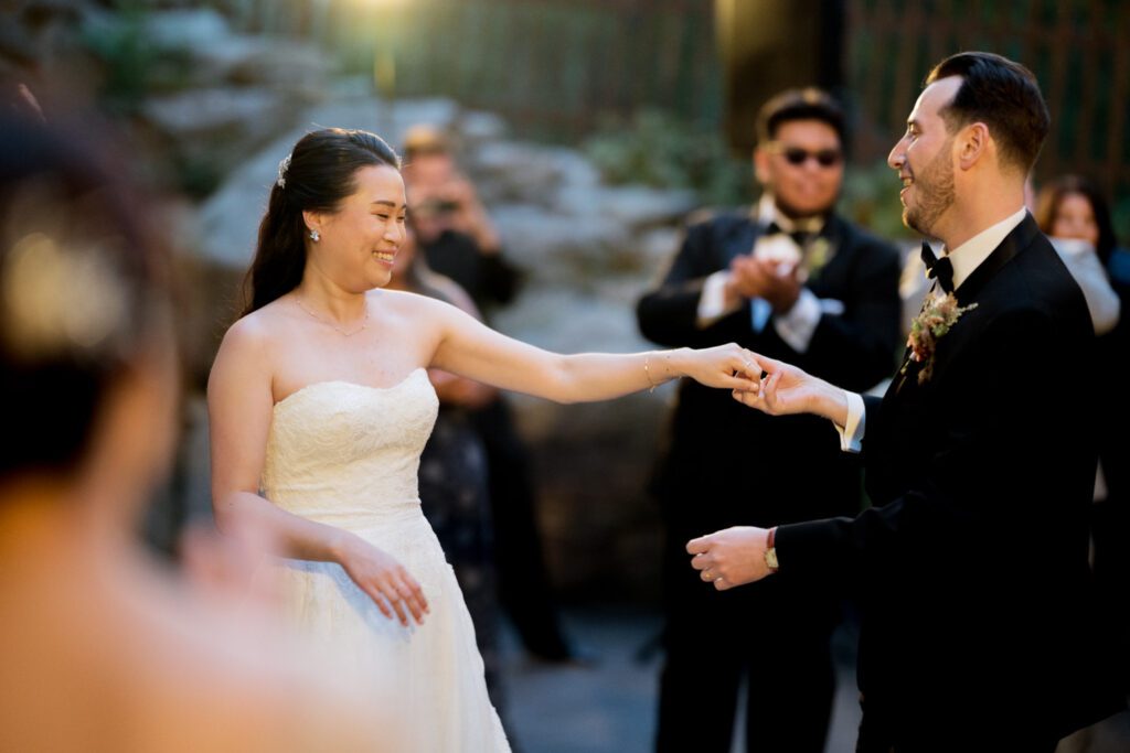 Vivian and Josh’s Gorgeous September Wedding at Arrow Park, NY
There’s something truly special about Arrow Park—it feels like my home away from home, and Vivian and Josh’s beautiful September wedding perfectly showcased everything this venue has to offer. Their blended celebration, honoring Vivian’s Korean heritage and Josh’s Jewish background, was a heartfelt and unforgettable day.
The couple beautifully wove their cultures into the festivities, from breaking the glass at the end of their garden ceremony to the lively horah during the reception. Later, Vivian and Josh delighted their guests by changing into traditional Korean hanbok outfits, a touching nod to her heritage.
Arrow Park: A Dream Venue for Multi-Day WeddingsVivian, Josh, and their loved ones all got ready at Arrow Park, which offers plenty of spacious accommodations for family and friends. This made it the perfect choice for their multi-day celebration. With its stunning grounds and versatile spaces, Arrow Park is ideal for couples seeking a wedding weekend filled with both elegance and comfort.
A Scenic September CelebrationThanks to the pleasant September weather, Vivian and Josh made full use of Arrow Park’s breathtaking grounds. Their day began with a magical first look along the iconic driveway lined with towering trees. From there, we explored the garden with its charming sculptures, captured moments by the ceremony’s floral décor, and took stunning portraits on the mansion’s iconic back staircase bathed in perfect lighting. We also ventured indoors for photos in the library and the Green Room, taking advantage of the mansion’s timeless charm.
As family and friends gathered, we captured formal portraits in front of the grand mansion before the ceremony began.
A Ceremony and Reception to RememberThe ceremony was set in the picturesque garden, where Jenny from Field Trip Flowers created a breathtaking floral backdrop that perfectly complemented the natural beauty of Arrow Park.
Afterward, guests strolled back to the mansion for a warm and inviting cocktail hour on the main floor. Later, everyone gathered in the courtyard for an enchanting outdoor reception under twinkling café lights. The space felt intimate yet grand, with the perfect blend of rustic elegance and romance.
Arrow Park’s charm, coupled with Vivian and Josh’s thoughtful cultural details, made this wedding one to remember. It’s the kind of venue where dreams come true—a hidden gem that’s ready to host your perfect day.
  
Thankful for all the wedding vendors that made this day possible:⁠
Venue: @arrowparkny
Floral: @fieldtripflowers

Vivian and Josh Arrow Park NY Wedding documented by Karis from Hey Karis New York, Brooklyn, Hudson Valley NY and Catskills NY and NJ Wedding and NYC Elopement Photographer.