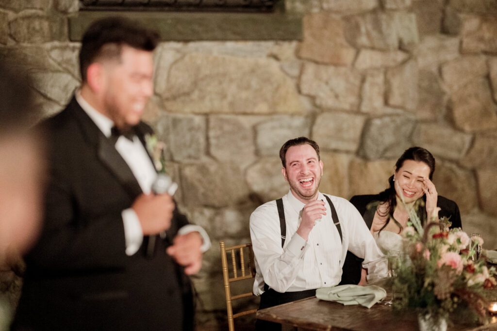 Vivian and Josh’s Gorgeous September Wedding at Arrow Park, NY
There’s something truly special about Arrow Park—it feels like my home away from home, and Vivian and Josh’s beautiful September wedding perfectly showcased everything this venue has to offer. Their blended celebration, honoring Vivian’s Korean heritage and Josh’s Jewish background, was a heartfelt and unforgettable day.
The couple beautifully wove their cultures into the festivities, from breaking the glass at the end of their garden ceremony to the lively horah during the reception. Later, Vivian and Josh delighted their guests by changing into traditional Korean hanbok outfits, a touching nod to her heritage.
Arrow Park: A Dream Venue for Multi-Day WeddingsVivian, Josh, and their loved ones all got ready at Arrow Park, which offers plenty of spacious accommodations for family and friends. This made it the perfect choice for their multi-day celebration. With its stunning grounds and versatile spaces, Arrow Park is ideal for couples seeking a wedding weekend filled with both elegance and comfort.
A Scenic September CelebrationThanks to the pleasant September weather, Vivian and Josh made full use of Arrow Park’s breathtaking grounds. Their day began with a magical first look along the iconic driveway lined with towering trees. From there, we explored the garden with its charming sculptures, captured moments by the ceremony’s floral décor, and took stunning portraits on the mansion’s iconic back staircase bathed in perfect lighting. We also ventured indoors for photos in the library and the Green Room, taking advantage of the mansion’s timeless charm.
As family and friends gathered, we captured formal portraits in front of the grand mansion before the ceremony began.
A Ceremony and Reception to RememberThe ceremony was set in the picturesque garden, where Jenny from Field Trip Flowers created a breathtaking floral backdrop that perfectly complemented the natural beauty of Arrow Park.
Afterward, guests strolled back to the mansion for a warm and inviting cocktail hour on the main floor. Later, everyone gathered in the courtyard for an enchanting outdoor reception under twinkling café lights. The space felt intimate yet grand, with the perfect blend of rustic elegance and romance.
Arrow Park’s charm, coupled with Vivian and Josh’s thoughtful cultural details, made this wedding one to remember. It’s the kind of venue where dreams come true—a hidden gem that’s ready to host your perfect day.
  
Thankful for all the wedding vendors that made this day possible:⁠
Venue: @arrowparkny
Floral: @fieldtripflowers

Vivian and Josh Arrow Park NY Wedding documented by Karis from Hey Karis New York, Brooklyn, Hudson Valley NY and Catskills NY and NJ Wedding and NYC Elopement Photographer.