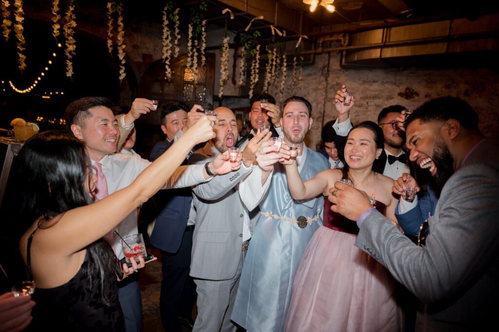 Vivian and Josh’s Gorgeous September Wedding at Arrow Park, NY
There’s something truly special about Arrow Park—it feels like my home away from home, and Vivian and Josh’s beautiful September wedding perfectly showcased everything this venue has to offer. Their blended celebration, honoring Vivian’s Korean heritage and Josh’s Jewish background, was a heartfelt and unforgettable day.
The couple beautifully wove their cultures into the festivities, from breaking the glass at the end of their garden ceremony to the lively horah during the reception. Later, Vivian and Josh delighted their guests by changing into traditional Korean hanbok outfits, a touching nod to her heritage.
Arrow Park: A Dream Venue for Multi-Day WeddingsVivian, Josh, and their loved ones all got ready at Arrow Park, which offers plenty of spacious accommodations for family and friends. This made it the perfect choice for their multi-day celebration. With its stunning grounds and versatile spaces, Arrow Park is ideal for couples seeking a wedding weekend filled with both elegance and comfort.
A Scenic September CelebrationThanks to the pleasant September weather, Vivian and Josh made full use of Arrow Park’s breathtaking grounds. Their day began with a magical first look along the iconic driveway lined with towering trees. From there, we explored the garden with its charming sculptures, captured moments by the ceremony’s floral décor, and took stunning portraits on the mansion’s iconic back staircase bathed in perfect lighting. We also ventured indoors for photos in the library and the Green Room, taking advantage of the mansion’s timeless charm.
As family and friends gathered, we captured formal portraits in front of the grand mansion before the ceremony began.
A Ceremony and Reception to RememberThe ceremony was set in the picturesque garden, where Jenny from Field Trip Flowers created a breathtaking floral backdrop that perfectly complemented the natural beauty of Arrow Park.
Afterward, guests strolled back to the mansion for a warm and inviting cocktail hour on the main floor. Later, everyone gathered in the courtyard for an enchanting outdoor reception under twinkling café lights. The space felt intimate yet grand, with the perfect blend of rustic elegance and romance.
Arrow Park’s charm, coupled with Vivian and Josh’s thoughtful cultural details, made this wedding one to remember. It’s the kind of venue where dreams come true—a hidden gem that’s ready to host your perfect day.
  
Thankful for all the wedding vendors that made this day possible:⁠
Venue: @arrowparkny
Floral: @fieldtripflowers

Vivian and Josh Arrow Park NY Wedding documented by Karis from Hey Karis New York, Brooklyn, Hudson Valley NY and Catskills NY and NJ Wedding and NYC Elopement Photographer.