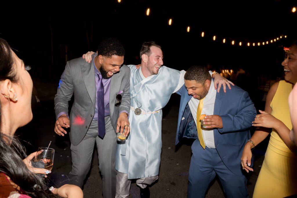 Vivian and Josh’s Gorgeous September Wedding at Arrow Park, NY

There’s something truly special about Arrow Park—it feels like my home away from home, and Vivian and Josh’s beautiful September wedding perfectly showcased everything this venue has to offer. Their blended celebration, honoring Vivian’s Korean heritage and Josh’s Jewish background, was a heartfelt and unforgettable day.

The couple beautifully wove their cultures into the festivities, from breaking the glass at the end of their garden ceremony to the lively horah during the reception. Later, Vivian and Josh delighted their guests by changing into traditional Korean hanbok outfits, a touching nod to her heritage.

Arrow Park: A Dream Venue for Multi-Day Weddings
Vivian, Josh, and their loved ones all got ready at Arrow Park, which offers plenty of spacious accommodations for family and friends. This made it the perfect choice for their multi-day celebration. With its stunning grounds and versatile spaces, Arrow Park is ideal for couples seeking a wedding weekend filled with both elegance and comfort.

A Scenic September Celebration
Thanks to the pleasant September weather, Vivian and Josh made full use of Arrow Park’s breathtaking grounds. Their day began with a magical first look along the iconic driveway lined with towering trees. From there, we explored the garden with its charming sculptures, captured moments by the ceremony’s floral décor, and took stunning portraits on the mansion’s iconic back staircase bathed in perfect lighting. We also ventured indoors for photos in the library and the Green Room, taking advantage of the mansion’s timeless charm.

As family and friends gathered, we captured formal portraits in front of the grand mansion before the ceremony began.

A Ceremony and Reception to Remember
The ceremony was set in the picturesque garden, where Jenny from Field Trip Flowers created a breathtaking floral backdrop that perfectly complemented the natural beauty of Arrow Park.

Afterward, guests strolled back to the mansion for a warm and inviting cocktail hour on the main floor. Later, everyone gathered in the courtyard for an enchanting outdoor reception under twinkling café lights. The space felt intimate yet grand, with the perfect blend of rustic elegance and romance.

Arrow Park’s charm, coupled with Vivian and Josh’s thoughtful cultural details, made this wedding one to remember. It’s the kind of venue where dreams come true—a hidden gem that’s ready to host your perfect day.

