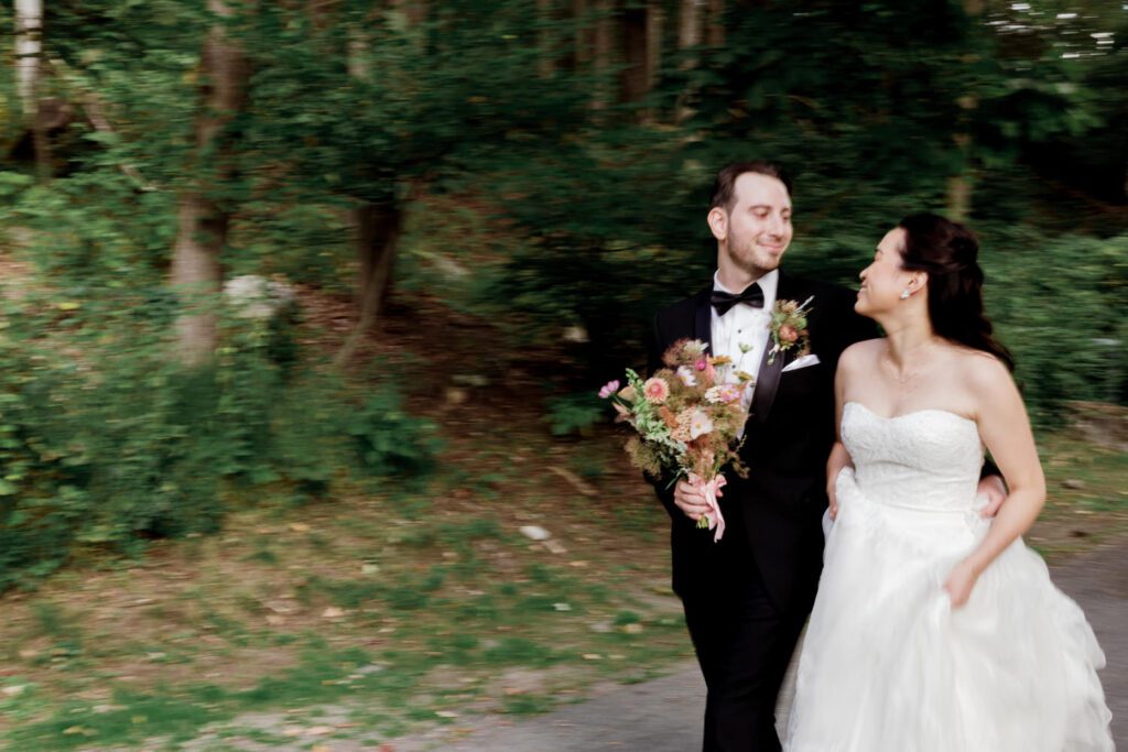 Vivian and Josh’s Gorgeous September Wedding at Arrow Park, NY
There’s something truly special about Arrow Park—it feels like my home away from home, and Vivian and Josh’s beautiful September wedding perfectly showcased everything this venue has to offer. Their blended celebration, honoring Vivian’s Korean heritage and Josh’s Jewish background, was a heartfelt and unforgettable day.
The couple beautifully wove their cultures into the festivities, from breaking the glass at the end of their garden ceremony to the lively horah during the reception. Later, Vivian and Josh delighted their guests by changing into traditional Korean hanbok outfits, a touching nod to her heritage.
Arrow Park: A Dream Venue for Multi-Day WeddingsVivian, Josh, and their loved ones all got ready at Arrow Park, which offers plenty of spacious accommodations for family and friends. This made it the perfect choice for their multi-day celebration. With its stunning grounds and versatile spaces, Arrow Park is ideal for couples seeking a wedding weekend filled with both elegance and comfort.
A Scenic September CelebrationThanks to the pleasant September weather, Vivian and Josh made full use of Arrow Park’s breathtaking grounds. Their day began with a magical first look along the iconic driveway lined with towering trees. From there, we explored the garden with its charming sculptures, captured moments by the ceremony’s floral décor, and took stunning portraits on the mansion’s iconic back staircase bathed in perfect lighting. We also ventured indoors for photos in the library and the Green Room, taking advantage of the mansion’s timeless charm.
As family and friends gathered, we captured formal portraits in front of the grand mansion before the ceremony began.
A Ceremony and Reception to RememberThe ceremony was set in the picturesque garden, where Jenny from Field Trip Flowers created a breathtaking floral backdrop that perfectly complemented the natural beauty of Arrow Park.
Afterward, guests strolled back to the mansion for a warm and inviting cocktail hour on the main floor. Later, everyone gathered in the courtyard for an enchanting outdoor reception under twinkling café lights. The space felt intimate yet grand, with the perfect blend of rustic elegance and romance.
Arrow Park’s charm, coupled with Vivian and Josh’s thoughtful cultural details, made this wedding one to remember. It’s the kind of venue where dreams come true—a hidden gem that’s ready to host your perfect day.
  
Thankful for all the wedding vendors that made this day possible:⁠
Venue: @arrowparkny
Floral: @fieldtripflowers
Catering: @lovenrosemary

Vivian and Josh Arrow Park NY Wedding documented by Karis from Hey Karis New York, Brooklyn, Hudson Valley NY and Catskills NY and NJ Wedding and NYC Elopement Photographer.