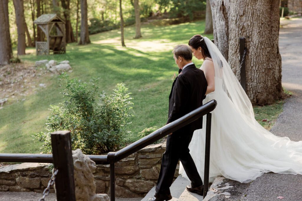Vivian and Josh’s Gorgeous September Wedding at Arrow Park, NY
There’s something truly special about Arrow Park—it feels like my home away from home, and Vivian and Josh’s beautiful September wedding perfectly showcased everything this venue has to offer. Their blended celebration, honoring Vivian’s Korean heritage and Josh’s Jewish background, was a heartfelt and unforgettable day.
The couple beautifully wove their cultures into the festivities, from breaking the glass at the end of their garden ceremony to the lively horah during the reception. Later, Vivian and Josh delighted their guests by changing into traditional Korean hanbok outfits, a touching nod to her heritage.
Arrow Park: A Dream Venue for Multi-Day WeddingsVivian, Josh, and their loved ones all got ready at Arrow Park, which offers plenty of spacious accommodations for family and friends. This made it the perfect choice for their multi-day celebration. With its stunning grounds and versatile spaces, Arrow Park is ideal for couples seeking a wedding weekend filled with both elegance and comfort.
A Scenic September CelebrationThanks to the pleasant September weather, Vivian and Josh made full use of Arrow Park’s breathtaking grounds. Their day began with a magical first look along the iconic driveway lined with towering trees. From there, we explored the garden with its charming sculptures, captured moments by the ceremony’s floral décor, and took stunning portraits on the mansion’s iconic back staircase bathed in perfect lighting. We also ventured indoors for photos in the library and the Green Room, taking advantage of the mansion’s timeless charm.
As family and friends gathered, we captured formal portraits in front of the grand mansion before the ceremony began.
A Ceremony and Reception to RememberThe ceremony was set in the picturesque garden, where Jenny from Field Trip Flowers created a breathtaking floral backdrop that perfectly complemented the natural beauty of Arrow Park.
Afterward, guests strolled back to the mansion for a warm and inviting cocktail hour on the main floor. Later, everyone gathered in the courtyard for an enchanting outdoor reception under twinkling café lights. The space felt intimate yet grand, with the perfect blend of rustic elegance and romance.
Arrow Park’s charm, coupled with Vivian and Josh’s thoughtful cultural details, made this wedding one to remember. It’s the kind of venue where dreams come true—a hidden gem that’s ready to host your perfect day.
  
Thankful for all the wedding vendors that made this day possible:⁠
Venue: @arrowparkny
Floral: @fieldtripflowers
Catering: @lovenrosemary

Vivian and Josh Arrow Park NY Wedding documented by Karis from Hey Karis New York, Brooklyn, Hudson Valley NY and Catskills NY and NJ Wedding and NYC Elopement Photographer.