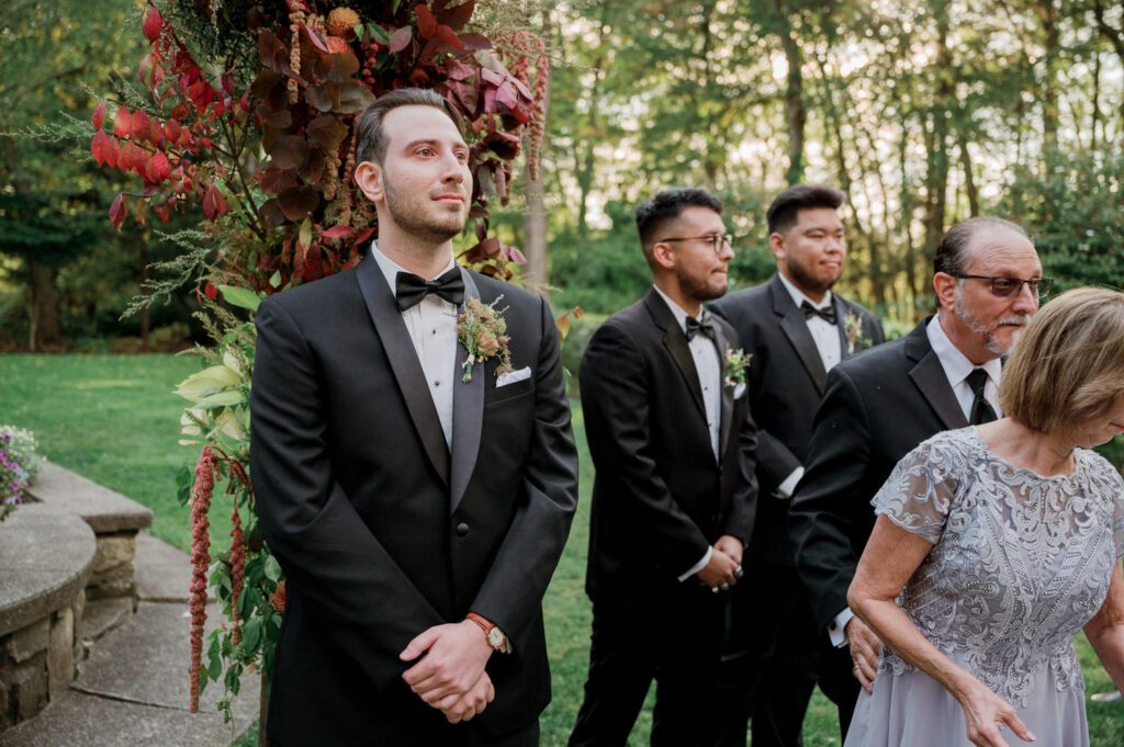 Vivian and Josh’s Gorgeous September Wedding at Arrow Park, NY
There’s something truly special about Arrow Park—it feels like my home away from home, and Vivian and Josh’s beautiful September wedding perfectly showcased everything this venue has to offer. Their blended celebration, honoring Vivian’s Korean heritage and Josh’s Jewish background, was a heartfelt and unforgettable day.
The couple beautifully wove their cultures into the festivities, from breaking the glass at the end of their garden ceremony to the lively horah during the reception. Later, Vivian and Josh delighted their guests by changing into traditional Korean hanbok outfits, a touching nod to her heritage.
Arrow Park: A Dream Venue for Multi-Day WeddingsVivian, Josh, and their loved ones all got ready at Arrow Park, which offers plenty of spacious accommodations for family and friends. This made it the perfect choice for their multi-day celebration. With its stunning grounds and versatile spaces, Arrow Park is ideal for couples seeking a wedding weekend filled with both elegance and comfort.
A Scenic September CelebrationThanks to the pleasant September weather, Vivian and Josh made full use of Arrow Park’s breathtaking grounds. Their day began with a magical first look along the iconic driveway lined with towering trees. From there, we explored the garden with its charming sculptures, captured moments by the ceremony’s floral décor, and took stunning portraits on the mansion’s iconic back staircase bathed in perfect lighting. We also ventured indoors for photos in the library and the Green Room, taking advantage of the mansion’s timeless charm.
As family and friends gathered, we captured formal portraits in front of the grand mansion before the ceremony began.
A Ceremony and Reception to RememberThe ceremony was set in the picturesque garden, where Jenny from Field Trip Flowers created a breathtaking floral backdrop that perfectly complemented the natural beauty of Arrow Park.
Afterward, guests strolled back to the mansion for a warm and inviting cocktail hour on the main floor. Later, everyone gathered in the courtyard for an enchanting outdoor reception under twinkling café lights. The space felt intimate yet grand, with the perfect blend of rustic elegance and romance.
Arrow Park’s charm, coupled with Vivian and Josh’s thoughtful cultural details, made this wedding one to remember. It’s the kind of venue where dreams come true—a hidden gem that’s ready to host your perfect day.
  
Thankful for all the wedding vendors that made this day possible:⁠
Venue: @arrowparkny
Floral: @fieldtripflowers
Catering: @lovenrosemary

Vivian and Josh Arrow Park NY Wedding documented by Karis from Hey Karis New York, Brooklyn, Hudson Valley NY and Catskills NY and NJ Wedding and NYC Elopement Photographer.