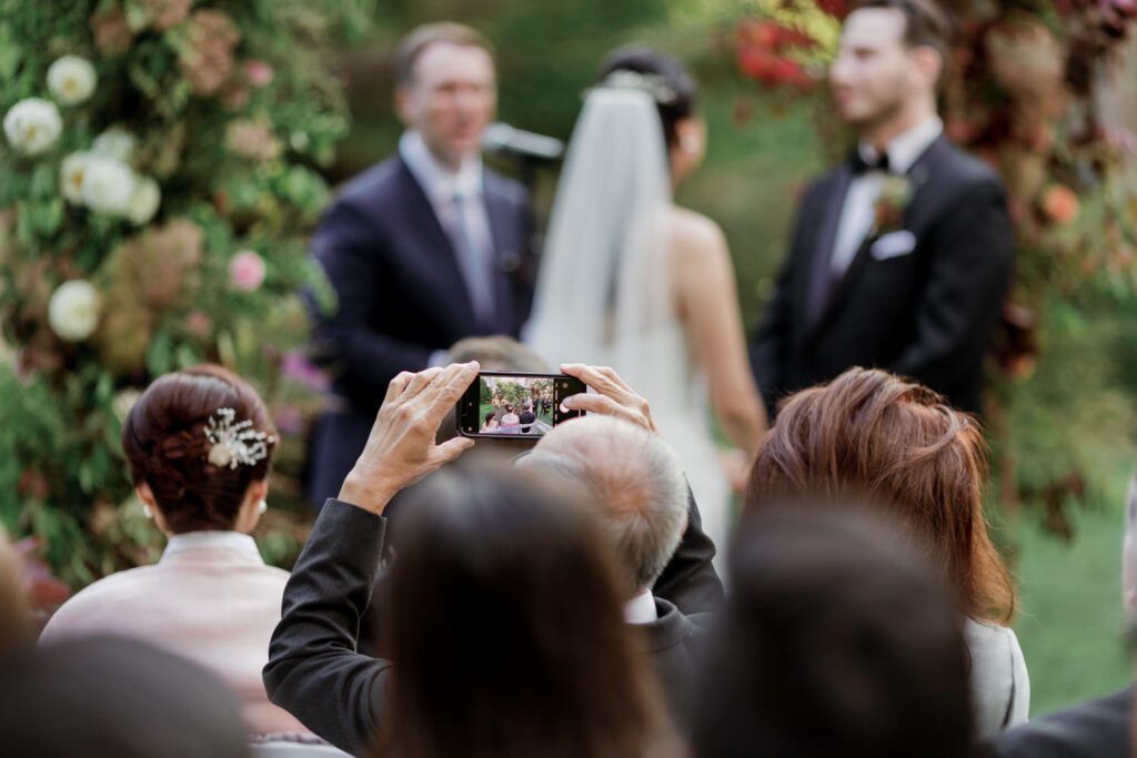Vivian and Josh’s Gorgeous September Wedding at Arrow Park, NY
There’s something truly special about Arrow Park—it feels like my home away from home, and Vivian and Josh’s beautiful September wedding perfectly showcased everything this venue has to offer. Their blended celebration, honoring Vivian’s Korean heritage and Josh’s Jewish background, was a heartfelt and unforgettable day.
The couple beautifully wove their cultures into the festivities, from breaking the glass at the end of their garden ceremony to the lively horah during the reception. Later, Vivian and Josh delighted their guests by changing into traditional Korean hanbok outfits, a touching nod to her heritage.
Arrow Park: A Dream Venue for Multi-Day WeddingsVivian, Josh, and their loved ones all got ready at Arrow Park, which offers plenty of spacious accommodations for family and friends. This made it the perfect choice for their multi-day celebration. With its stunning grounds and versatile spaces, Arrow Park is ideal for couples seeking a wedding weekend filled with both elegance and comfort.
A Scenic September CelebrationThanks to the pleasant September weather, Vivian and Josh made full use of Arrow Park’s breathtaking grounds. Their day began with a magical first look along the iconic driveway lined with towering trees. From there, we explored the garden with its charming sculptures, captured moments by the ceremony’s floral décor, and took stunning portraits on the mansion’s iconic back staircase bathed in perfect lighting. We also ventured indoors for photos in the library and the Green Room, taking advantage of the mansion’s timeless charm.
As family and friends gathered, we captured formal portraits in front of the grand mansion before the ceremony began.
A Ceremony and Reception to RememberThe ceremony was set in the picturesque garden, where Jenny from Field Trip Flowers created a breathtaking floral backdrop that perfectly complemented the natural beauty of Arrow Park.
Afterward, guests strolled back to the mansion for a warm and inviting cocktail hour on the main floor. Later, everyone gathered in the courtyard for an enchanting outdoor reception under twinkling café lights. The space felt intimate yet grand, with the perfect blend of rustic elegance and romance.
Arrow Park’s charm, coupled with Vivian and Josh’s thoughtful cultural details, made this wedding one to remember. It’s the kind of venue where dreams come true—a hidden gem that’s ready to host your perfect day.
  
Thankful for all the wedding vendors that made this day possible:⁠
Venue: @arrowparkny
Floral: @fieldtripflowers
Catering: @lovenrosemary

Vivian and Josh Arrow Park NY Wedding documented by Karis from Hey Karis New York, Brooklyn, Hudson Valley NY and Catskills NY and NJ Wedding and NYC Elopement Photographer.