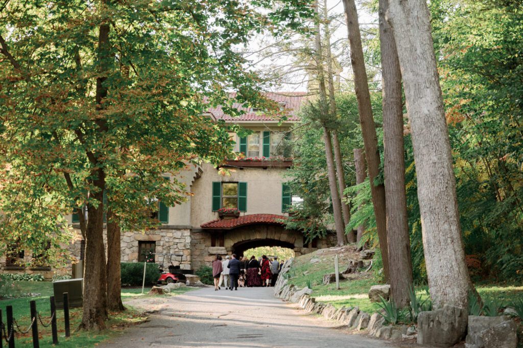 Vivian and Josh’s Gorgeous September Wedding at Arrow Park, NY
There’s something truly special about Arrow Park—it feels like my home away from home, and Vivian and Josh’s beautiful September wedding perfectly showcased everything this venue has to offer. Their blended celebration, honoring Vivian’s Korean heritage and Josh’s Jewish background, was a heartfelt and unforgettable day.
The couple beautifully wove their cultures into the festivities, from breaking the glass at the end of their garden ceremony to the lively horah during the reception. Later, Vivian and Josh delighted their guests by changing into traditional Korean hanbok outfits, a touching nod to her heritage.
Arrow Park: A Dream Venue for Multi-Day WeddingsVivian, Josh, and their loved ones all got ready at Arrow Park, which offers plenty of spacious accommodations for family and friends. This made it the perfect choice for their multi-day celebration. With its stunning grounds and versatile spaces, Arrow Park is ideal for couples seeking a wedding weekend filled with both elegance and comfort.
A Scenic September CelebrationThanks to the pleasant September weather, Vivian and Josh made full use of Arrow Park’s breathtaking grounds. Their day began with a magical first look along the iconic driveway lined with towering trees. From there, we explored the garden with its charming sculptures, captured moments by the ceremony’s floral décor, and took stunning portraits on the mansion’s iconic back staircase bathed in perfect lighting. We also ventured indoors for photos in the library and the Green Room, taking advantage of the mansion’s timeless charm.
As family and friends gathered, we captured formal portraits in front of the grand mansion before the ceremony began.
A Ceremony and Reception to RememberThe ceremony was set in the picturesque garden, where Jenny from Field Trip Flowers created a breathtaking floral backdrop that perfectly complemented the natural beauty of Arrow Park.
Afterward, guests strolled back to the mansion for a warm and inviting cocktail hour on the main floor. Later, everyone gathered in the courtyard for an enchanting outdoor reception under twinkling café lights. The space felt intimate yet grand, with the perfect blend of rustic elegance and romance.
Arrow Park’s charm, coupled with Vivian and Josh’s thoughtful cultural details, made this wedding one to remember. It’s the kind of venue where dreams come true—a hidden gem that’s ready to host your perfect day.
  
Thankful for all the wedding vendors that made this day possible:⁠
Venue: @arrowparkny
Floral: @fieldtripflowers

Vivian and Josh Arrow Park NY Wedding documented by Karis from Hey Karis New York, Brooklyn, Hudson Valley NY and Catskills NY and NJ Wedding and NYC Elopement Photographer.