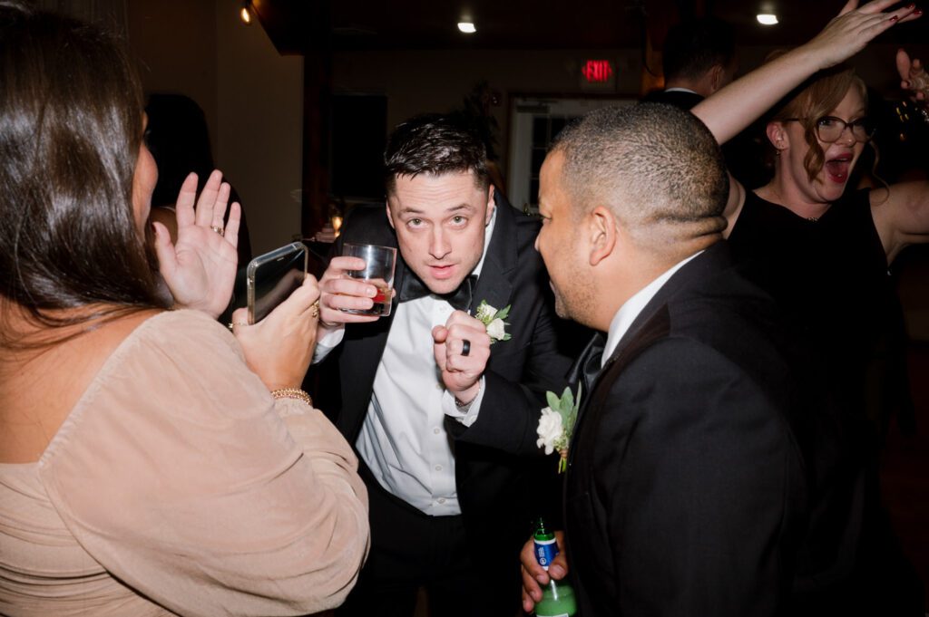 Kirsten and AJ’s September Wedding at Arrow Park, NY
Kirsten and AJ’s wedding day was a bit chilly and rainy, but their flexibility and positivity turned the day into a magical celebration. Originally planned for the garden, the ceremony was moved indoors due to the autumn rain. The staff at Arrow Park seamlessly transitioned the setup to the mansion’s main floor, creating an intimate and elegant ceremony space. The historic charm of the mansion, with its grand details and warm ambiance, added a cozy, romantic touch to their special day.
Kirsten, a talented fashion designer, surprised everyone—including her groom, AJ—by wearing a stunning black velvet strapless dress with an oversized white bow draping dramatically down the back. She designed the dress herself, and it was a show-stopper that perfectly reflected her unique style. The ceremony was heartfelt and personal, with family and friends gathering close to witness Kirsten and AJ’s vows.
After the ceremony, the main mansion was transformed to host a lively cocktail hour. Guests mingled and enjoyed delicious hors d'oeuvres while the reception space in the pavilion was being prepared. Kirsten and AJ’s attention to detail shone through in their décor choices, including the black-and-white checkered flooring that gave the pavilion a retro vibe. It was a perfect blend of modern chic and classic sophistication.
The reception began with Kirsten and AJ’s grand entrance, greeted by cheers from their guests. Their first dance was sweet and endearing, setting the tone for a night of joy and celebration. As the evening progressed, the party ramped up with enthusiastic dancing, heartfelt toasts, and even a surprise performance—a few uncles took the mic for an impromptu rap song that brought the house down.
Arrow Park provided the perfect backdrop for Kirsten and AJ’s wedding. With its blend of natural beauty and historic architecture, it’s an ideal venue for couples seeking a mix of indoor and outdoor spaces. The mansion offers a timeless elegance, while the pavilion provides a versatile setting for larger receptions.
Planning Tips for Future Couples at Arrow Park:
1. Have a Rain Plan: September weather can be unpredictable, so work with the Arrow Park staff to plan for both indoor and outdoor options. The mansion’s interiors provide a stunning alternative for ceremonies or cocktail hours.
2. Maximize the Pavilion: The pavilion’s spacious layout can accommodate various themes and setups. Consider unique flooring, lighting, or drapery to make the space your own.
3. Embrace the Venue’s Charm: Use the mansion’s historic features—like the fireplaces and vintage decor—as part of your wedding aesthetic. It’s a built-in backdrop that needs little embellishment.
4. Plan Time for Photos: Arrow Park’s grounds are breathtaking, especially in the fall. Schedule time with your photographer to capture the beauty of the lake, gardens, and mansion.
Kirsten and AJ’s wedding was a true testament to the power of creativity, adaptability, and love. Their celebration at Arrow Park was unforgettable, and I’m grateful to have been a part of their special day.
Thankful for all the wedding vendors that made this day possible:⁠
Venue: @arrowparkny
Catering: @lovenrosemary
Kirsten and AJ Arrow Park NY Wedding documented by Karis from Hey Karis New York, Brooklyn, Hudson Valley NY and Catskills NY and NJ Wedding and NYC Elopement Photographer.