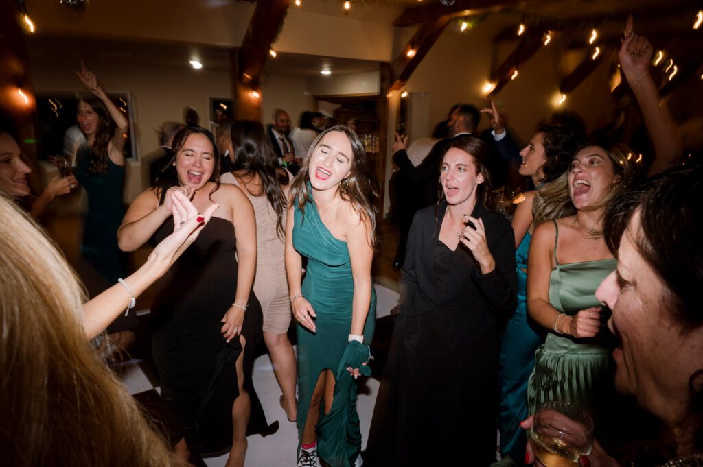 Kirsten and AJ’s September Wedding at Arrow Park, NY
Kirsten and AJ’s wedding day was a bit chilly and rainy, but their flexibility and positivity turned the day into a magical celebration. Originally planned for the garden, the ceremony was moved indoors due to the autumn rain. The staff at Arrow Park seamlessly transitioned the setup to the mansion’s main floor, creating an intimate and elegant ceremony space. The historic charm of the mansion, with its grand details and warm ambiance, added a cozy, romantic touch to their special day.
Kirsten, a talented fashion designer, surprised everyone—including her groom, AJ—by wearing a stunning black velvet strapless dress with an oversized white bow draping dramatically down the back. She designed the dress herself, and it was a show-stopper that perfectly reflected her unique style. The ceremony was heartfelt and personal, with family and friends gathering close to witness Kirsten and AJ’s vows.
After the ceremony, the main mansion was transformed to host a lively cocktail hour. Guests mingled and enjoyed delicious hors d'oeuvres while the reception space in the pavilion was being prepared. Kirsten and AJ’s attention to detail shone through in their décor choices, including the black-and-white checkered flooring that gave the pavilion a retro vibe. It was a perfect blend of modern chic and classic sophistication.
The reception began with Kirsten and AJ’s grand entrance, greeted by cheers from their guests. Their first dance was sweet and endearing, setting the tone for a night of joy and celebration. As the evening progressed, the party ramped up with enthusiastic dancing, heartfelt toasts, and even a surprise performance—a few uncles took the mic for an impromptu rap song that brought the house down.
Arrow Park provided the perfect backdrop for Kirsten and AJ’s wedding. With its blend of natural beauty and historic architecture, it’s an ideal venue for couples seeking a mix of indoor and outdoor spaces. The mansion offers a timeless elegance, while the pavilion provides a versatile setting for larger receptions.
Planning Tips for Future Couples at Arrow Park:
1. Have a Rain Plan: September weather can be unpredictable, so work with the Arrow Park staff to plan for both indoor and outdoor options. The mansion’s interiors provide a stunning alternative for ceremonies or cocktail hours.
2. Maximize the Pavilion: The pavilion’s spacious layout can accommodate various themes and setups. Consider unique flooring, lighting, or drapery to make the space your own.
3. Embrace the Venue’s Charm: Use the mansion’s historic features—like the fireplaces and vintage decor—as part of your wedding aesthetic. It’s a built-in backdrop that needs little embellishment.
4. Plan Time for Photos: Arrow Park’s grounds are breathtaking, especially in the fall. Schedule time with your photographer to capture the beauty of the lake, gardens, and mansion.
Kirsten and AJ’s wedding was a true testament to the power of creativity, adaptability, and love. Their celebration at Arrow Park was unforgettable, and I’m grateful to have been a part of their special day.
Thankful for all the wedding vendors that made this day possible:⁠
Venue: @arrowparkny
Catering: @lovenrosemary
Kirsten and AJ Arrow Park NY Wedding documented by Karis from Hey Karis New York, Brooklyn, Hudson Valley NY and Catskills NY and NJ Wedding and NYC Elopement Photographer.