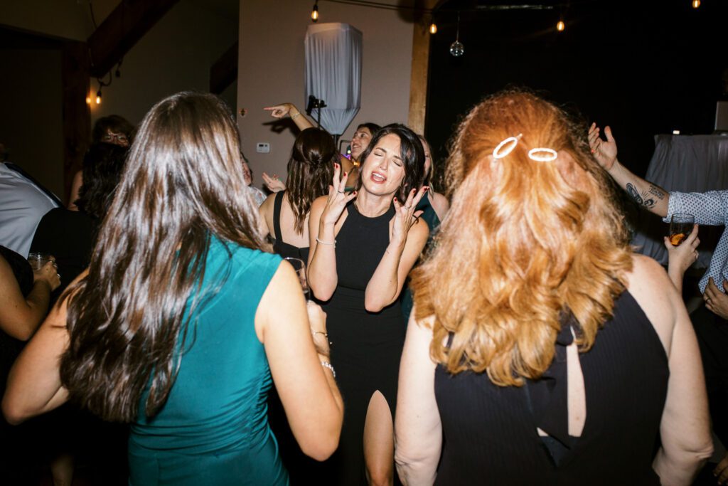 Kirsten and AJ’s September Wedding at Arrow Park, NY
Kirsten and AJ’s wedding day was a bit chilly and rainy, but their flexibility and positivity turned the day into a magical celebration. Originally planned for the garden, the ceremony was moved indoors due to the autumn rain. The staff at Arrow Park seamlessly transitioned the setup to the mansion’s main floor, creating an intimate and elegant ceremony space. The historic charm of the mansion, with its grand details and warm ambiance, added a cozy, romantic touch to their special day.
Kirsten, a talented fashion designer, surprised everyone—including her groom, AJ—by wearing a stunning black velvet strapless dress with an oversized white bow draping dramatically down the back. She designed the dress herself, and it was a show-stopper that perfectly reflected her unique style. The ceremony was heartfelt and personal, with family and friends gathering close to witness Kirsten and AJ’s vows.
After the ceremony, the main mansion was transformed to host a lively cocktail hour. Guests mingled and enjoyed delicious hors d'oeuvres while the reception space in the pavilion was being prepared. Kirsten and AJ’s attention to detail shone through in their décor choices, including the black-and-white checkered flooring that gave the pavilion a retro vibe. It was a perfect blend of modern chic and classic sophistication.
The reception began with Kirsten and AJ’s grand entrance, greeted by cheers from their guests. Their first dance was sweet and endearing, setting the tone for a night of joy and celebration. As the evening progressed, the party ramped up with enthusiastic dancing, heartfelt toasts, and even a surprise performance—a few uncles took the mic for an impromptu rap song that brought the house down.
Arrow Park provided the perfect backdrop for Kirsten and AJ’s wedding. With its blend of natural beauty and historic architecture, it’s an ideal venue for couples seeking a mix of indoor and outdoor spaces. The mansion offers a timeless elegance, while the pavilion provides a versatile setting for larger receptions.
Planning Tips for Future Couples at Arrow Park:
1. Have a Rain Plan: September weather can be unpredictable, so work with the Arrow Park staff to plan for both indoor and outdoor options. The mansion’s interiors provide a stunning alternative for ceremonies or cocktail hours.
2. Maximize the Pavilion: The pavilion’s spacious layout can accommodate various themes and setups. Consider unique flooring, lighting, or drapery to make the space your own.
3. Embrace the Venue’s Charm: Use the mansion’s historic features—like the fireplaces and vintage decor—as part of your wedding aesthetic. It’s a built-in backdrop that needs little embellishment.
4. Plan Time for Photos: Arrow Park’s grounds are breathtaking, especially in the fall. Schedule time with your photographer to capture the beauty of the lake, gardens, and mansion.
Kirsten and AJ’s wedding was a true testament to the power of creativity, adaptability, and love. Their celebration at Arrow Park was unforgettable, and I’m grateful to have been a part of their special day.
Thankful for all the wedding vendors that made this day possible:⁠
Venue: @arrowparkny
Catering: @lovenrosemary
Kirsten and AJ Arrow Park NY Wedding documented by Karis from Hey Karis New York, Brooklyn, Hudson Valley NY and Catskills NY and NJ Wedding and NYC Elopement Photographer.