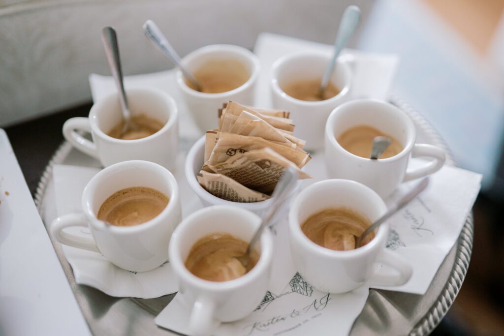 Kirsten and AJ’s September Wedding at Arrow Park, NY
Kirsten and AJ’s wedding day was a bit chilly and rainy, but their flexibility and positivity turned the day into a magical celebration. Originally planned for the garden, the ceremony was moved indoors due to the autumn rain. The staff at Arrow Park seamlessly transitioned the setup to the mansion’s main floor, creating an intimate and elegant ceremony space. The historic charm of the mansion, with its grand details and warm ambiance, added a cozy, romantic touch to their special day.
Kirsten, a talented fashion designer, surprised everyone—including her groom, AJ—by wearing a stunning black velvet strapless dress with an oversized white bow draping dramatically down the back. She designed the dress herself, and it was a show-stopper that perfectly reflected her unique style. The ceremony was heartfelt and personal, with family and friends gathering close to witness Kirsten and AJ’s vows.
After the ceremony, the main mansion was transformed to host a lively cocktail hour. Guests mingled and enjoyed delicious hors d'oeuvres while the reception space in the pavilion was being prepared. Kirsten and AJ’s attention to detail shone through in their décor choices, including the black-and-white checkered flooring that gave the pavilion a retro vibe. It was a perfect blend of modern chic and classic sophistication.
The reception began with Kirsten and AJ’s grand entrance, greeted by cheers from their guests. Their first dance was sweet and endearing, setting the tone for a night of joy and celebration. As the evening progressed, the party ramped up with enthusiastic dancing, heartfelt toasts, and even a surprise performance—a few uncles took the mic for an impromptu rap song that brought the house down.
Arrow Park provided the perfect backdrop for Kirsten and AJ’s wedding. With its blend of natural beauty and historic architecture, it’s an ideal venue for couples seeking a mix of indoor and outdoor spaces. The mansion offers a timeless elegance, while the pavilion provides a versatile setting for larger receptions.
Planning Tips for Future Couples at Arrow Park:
1. Have a Rain Plan: September weather can be unpredictable, so work with the Arrow Park staff to plan for both indoor and outdoor options. The mansion’s interiors provide a stunning alternative for ceremonies or cocktail hours.
2. Maximize the Pavilion: The pavilion’s spacious layout can accommodate various themes and setups. Consider unique flooring, lighting, or drapery to make the space your own.
3. Embrace the Venue’s Charm: Use the mansion’s historic features—like the fireplaces and vintage decor—as part of your wedding aesthetic. It’s a built-in backdrop that needs little embellishment.
4. Plan Time for Photos: Arrow Park’s grounds are breathtaking, especially in the fall. Schedule time with your photographer to capture the beauty of the lake, gardens, and mansion.
Kirsten and AJ’s wedding was a true testament to the power of creativity, adaptability, and love. Their celebration at Arrow Park was unforgettable, and I’m grateful to have been a part of their special day.
Thankful for all the wedding vendors that made this day possible:⁠
Venue: @arrowparkny
Catering: @lovenrosemary
Kirsten and AJ Arrow Park NY Wedding documented by Karis from Hey Karis New York, Brooklyn, Hudson Valley NY and Catskills NY and NJ Wedding and NYC Elopement Photographer.