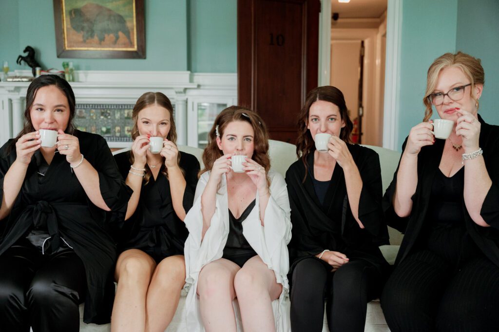 Kirsten and AJ’s September Wedding at Arrow Park, NY
Kirsten and AJ’s wedding day was a bit chilly and rainy, but their flexibility and positivity turned the day into a magical celebration. Originally planned for the garden, the ceremony was moved indoors due to the autumn rain. The staff at Arrow Park seamlessly transitioned the setup to the mansion’s main floor, creating an intimate and elegant ceremony space. The historic charm of the mansion, with its grand details and warm ambiance, added a cozy, romantic touch to their special day.
Kirsten, a talented fashion designer, surprised everyone—including her groom, AJ—by wearing a stunning black velvet strapless dress with an oversized white bow draping dramatically down the back. She designed the dress herself, and it was a show-stopper that perfectly reflected her unique style. The ceremony was heartfelt and personal, with family and friends gathering close to witness Kirsten and AJ’s vows.
After the ceremony, the main mansion was transformed to host a lively cocktail hour. Guests mingled and enjoyed delicious hors d'oeuvres while the reception space in the pavilion was being prepared. Kirsten and AJ’s attention to detail shone through in their décor choices, including the black-and-white checkered flooring that gave the pavilion a retro vibe. It was a perfect blend of modern chic and classic sophistication.
The reception began with Kirsten and AJ’s grand entrance, greeted by cheers from their guests. Their first dance was sweet and endearing, setting the tone for a night of joy and celebration. As the evening progressed, the party ramped up with enthusiastic dancing, heartfelt toasts, and even a surprise performance—a few uncles took the mic for an impromptu rap song that brought the house down.
Arrow Park provided the perfect backdrop for Kirsten and AJ’s wedding. With its blend of natural beauty and historic architecture, it’s an ideal venue for couples seeking a mix of indoor and outdoor spaces. The mansion offers a timeless elegance, while the pavilion provides a versatile setting for larger receptions.
Planning Tips for Future Couples at Arrow Park:
1. Have a Rain Plan: September weather can be unpredictable, so work with the Arrow Park staff to plan for both indoor and outdoor options. The mansion’s interiors provide a stunning alternative for ceremonies or cocktail hours.
2. Maximize the Pavilion: The pavilion’s spacious layout can accommodate various themes and setups. Consider unique flooring, lighting, or drapery to make the space your own.
3. Embrace the Venue’s Charm: Use the mansion’s historic features—like the fireplaces and vintage decor—as part of your wedding aesthetic. It’s a built-in backdrop that needs little embellishment.
4. Plan Time for Photos: Arrow Park’s grounds are breathtaking, especially in the fall. Schedule time with your photographer to capture the beauty of the lake, gardens, and mansion.
Kirsten and AJ’s wedding was a true testament to the power of creativity, adaptability, and love. Their celebration at Arrow Park was unforgettable, and I’m grateful to have been a part of their special day.
Thankful for all the wedding vendors that made this day possible:⁠
Venue: @arrowparkny
Catering: @lovenrosemary
Kirsten and AJ Arrow Park NY Wedding documented by Karis from Hey Karis New York, Brooklyn, Hudson Valley NY and Catskills NY and NJ Wedding and NYC Elopement Photographer.