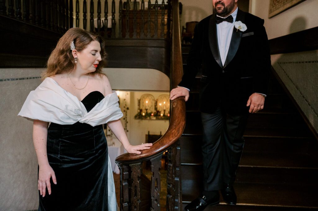 Kirsten and AJ’s September Wedding at Arrow Park, NY
Kirsten and AJ’s wedding day was a bit chilly and rainy, but their flexibility and positivity turned the day into a magical celebration. Originally planned for the garden, the ceremony was moved indoors due to the autumn rain. The staff at Arrow Park seamlessly transitioned the setup to the mansion’s main floor, creating an intimate and elegant ceremony space. The historic charm of the mansion, with its grand details and warm ambiance, added a cozy, romantic touch to their special day.
Kirsten, a talented fashion designer, surprised everyone—including her groom, AJ—by wearing a stunning black velvet strapless dress with an oversized white bow draping dramatically down the back. She designed the dress herself, and it was a show-stopper that perfectly reflected her unique style. The ceremony was heartfelt and personal, with family and friends gathering close to witness Kirsten and AJ’s vows.
After the ceremony, the main mansion was transformed to host a lively cocktail hour. Guests mingled and enjoyed delicious hors d'oeuvres while the reception space in the pavilion was being prepared. Kirsten and AJ’s attention to detail shone through in their décor choices, including the black-and-white checkered flooring that gave the pavilion a retro vibe. It was a perfect blend of modern chic and classic sophistication.
The reception began with Kirsten and AJ’s grand entrance, greeted by cheers from their guests. Their first dance was sweet and endearing, setting the tone for a night of joy and celebration. As the evening progressed, the party ramped up with enthusiastic dancing, heartfelt toasts, and even a surprise performance—a few uncles took the mic for an impromptu rap song that brought the house down.
Arrow Park provided the perfect backdrop for Kirsten and AJ’s wedding. With its blend of natural beauty and historic architecture, it’s an ideal venue for couples seeking a mix of indoor and outdoor spaces. The mansion offers a timeless elegance, while the pavilion provides a versatile setting for larger receptions.
Planning Tips for Future Couples at Arrow Park:
1. Have a Rain Plan: September weather can be unpredictable, so work with the Arrow Park staff to plan for both indoor and outdoor options. The mansion’s interiors provide a stunning alternative for ceremonies or cocktail hours.
2. Maximize the Pavilion: The pavilion’s spacious layout can accommodate various themes and setups. Consider unique flooring, lighting, or drapery to make the space your own.
3. Embrace the Venue’s Charm: Use the mansion’s historic features—like the fireplaces and vintage decor—as part of your wedding aesthetic. It’s a built-in backdrop that needs little embellishment.
4. Plan Time for Photos: Arrow Park’s grounds are breathtaking, especially in the fall. Schedule time with your photographer to capture the beauty of the lake, gardens, and mansion.
Kirsten and AJ’s wedding was a true testament to the power of creativity, adaptability, and love. Their celebration at Arrow Park was unforgettable, and I’m grateful to have been a part of their special day.
Thankful for all the wedding vendors that made this day possible:⁠
Venue: @arrowparkny
Catering: @lovenrosemary
Kirsten and AJ Arrow Park NY Wedding documented by Karis from Hey Karis New York, Brooklyn, Hudson Valley NY and Catskills NY and NJ Wedding and NYC Elopement Photographer.