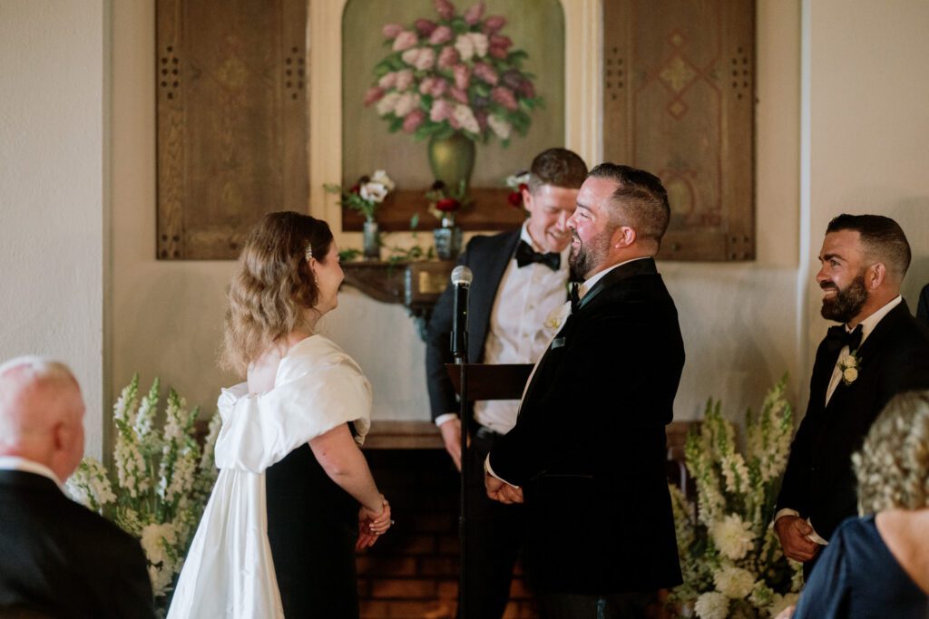 Kirsten and AJ’s September Wedding at Arrow Park, NY
Kirsten and AJ’s wedding day was a bit chilly and rainy, but their flexibility and positivity turned the day into a magical celebration. Originally planned for the garden, the ceremony was moved indoors due to the autumn rain. The staff at Arrow Park seamlessly transitioned the setup to the mansion’s main floor, creating an intimate and elegant ceremony space. The historic charm of the mansion, with its grand details and warm ambiance, added a cozy, romantic touch to their special day.
Kirsten, a talented fashion designer, surprised everyone—including her groom, AJ—by wearing a stunning black velvet strapless dress with an oversized white bow draping dramatically down the back. She designed the dress herself, and it was a show-stopper that perfectly reflected her unique style. The ceremony was heartfelt and personal, with family and friends gathering close to witness Kirsten and AJ’s vows.
After the ceremony, the main mansion was transformed to host a lively cocktail hour. Guests mingled and enjoyed delicious hors d'oeuvres while the reception space in the pavilion was being prepared. Kirsten and AJ’s attention to detail shone through in their décor choices, including the black-and-white checkered flooring that gave the pavilion a retro vibe. It was a perfect blend of modern chic and classic sophistication.
The reception began with Kirsten and AJ’s grand entrance, greeted by cheers from their guests. Their first dance was sweet and endearing, setting the tone for a night of joy and celebration. As the evening progressed, the party ramped up with enthusiastic dancing, heartfelt toasts, and even a surprise performance—a few uncles took the mic for an impromptu rap song that brought the house down.
Arrow Park provided the perfect backdrop for Kirsten and AJ’s wedding. With its blend of natural beauty and historic architecture, it’s an ideal venue for couples seeking a mix of indoor and outdoor spaces. The mansion offers a timeless elegance, while the pavilion provides a versatile setting for larger receptions.
Planning Tips for Future Couples at Arrow Park:
1. Have a Rain Plan: September weather can be unpredictable, so work with the Arrow Park staff to plan for both indoor and outdoor options. The mansion’s interiors provide a stunning alternative for ceremonies or cocktail hours.
2. Maximize the Pavilion: The pavilion’s spacious layout can accommodate various themes and setups. Consider unique flooring, lighting, or drapery to make the space your own.
3. Embrace the Venue’s Charm: Use the mansion’s historic features—like the fireplaces and vintage decor—as part of your wedding aesthetic. It’s a built-in backdrop that needs little embellishment.
4. Plan Time for Photos: Arrow Park’s grounds are breathtaking, especially in the fall. Schedule time with your photographer to capture the beauty of the lake, gardens, and mansion.
Kirsten and AJ’s wedding was a true testament to the power of creativity, adaptability, and love. Their celebration at Arrow Park was unforgettable, and I’m grateful to have been a part of their special day.
Thankful for all the wedding vendors that made this day possible:⁠
Venue: @arrowparkny
Catering: @lovenrosemary
Kirsten and AJ Arrow Park NY Wedding documented by Karis from Hey Karis New York, Brooklyn, Hudson Valley NY and Catskills NY and NJ Wedding and NYC Elopement Photographer.