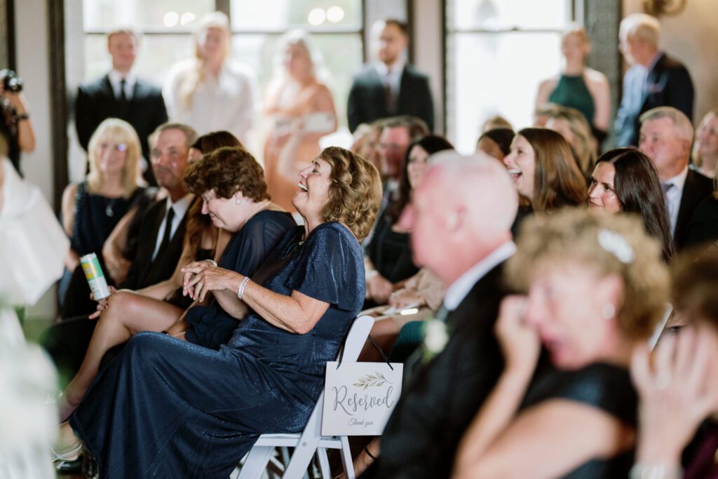 Kirsten and AJ’s September Wedding at Arrow Park, NY
Kirsten and AJ’s wedding day was a bit chilly and rainy, but their flexibility and positivity turned the day into a magical celebration. Originally planned for the garden, the ceremony was moved indoors due to the autumn rain. The staff at Arrow Park seamlessly transitioned the setup to the mansion’s main floor, creating an intimate and elegant ceremony space. The historic charm of the mansion, with its grand details and warm ambiance, added a cozy, romantic touch to their special day.
Kirsten, a talented fashion designer, surprised everyone—including her groom, AJ—by wearing a stunning black velvet strapless dress with an oversized white bow draping dramatically down the back. She designed the dress herself, and it was a show-stopper that perfectly reflected her unique style. The ceremony was heartfelt and personal, with family and friends gathering close to witness Kirsten and AJ’s vows.
After the ceremony, the main mansion was transformed to host a lively cocktail hour. Guests mingled and enjoyed delicious hors d'oeuvres while the reception space in the pavilion was being prepared. Kirsten and AJ’s attention to detail shone through in their décor choices, including the black-and-white checkered flooring that gave the pavilion a retro vibe. It was a perfect blend of modern chic and classic sophistication.
The reception began with Kirsten and AJ’s grand entrance, greeted by cheers from their guests. Their first dance was sweet and endearing, setting the tone for a night of joy and celebration. As the evening progressed, the party ramped up with enthusiastic dancing, heartfelt toasts, and even a surprise performance—a few uncles took the mic for an impromptu rap song that brought the house down.
Arrow Park provided the perfect backdrop for Kirsten and AJ’s wedding. With its blend of natural beauty and historic architecture, it’s an ideal venue for couples seeking a mix of indoor and outdoor spaces. The mansion offers a timeless elegance, while the pavilion provides a versatile setting for larger receptions.
Planning Tips for Future Couples at Arrow Park:
1. Have a Rain Plan: September weather can be unpredictable, so work with the Arrow Park staff to plan for both indoor and outdoor options. The mansion’s interiors provide a stunning alternative for ceremonies or cocktail hours.
2. Maximize the Pavilion: The pavilion’s spacious layout can accommodate various themes and setups. Consider unique flooring, lighting, or drapery to make the space your own.
3. Embrace the Venue’s Charm: Use the mansion’s historic features—like the fireplaces and vintage decor—as part of your wedding aesthetic. It’s a built-in backdrop that needs little embellishment.
4. Plan Time for Photos: Arrow Park’s grounds are breathtaking, especially in the fall. Schedule time with your photographer to capture the beauty of the lake, gardens, and mansion.
Kirsten and AJ’s wedding was a true testament to the power of creativity, adaptability, and love. Their celebration at Arrow Park was unforgettable, and I’m grateful to have been a part of their special day.
Thankful for all the wedding vendors that made this day possible:⁠
Venue: @arrowparkny
Catering: @lovenrosemary
Kirsten and AJ Arrow Park NY Wedding documented by Karis from Hey Karis New York, Brooklyn, Hudson Valley NY and Catskills NY and NJ Wedding and NYC Elopement Photographer.