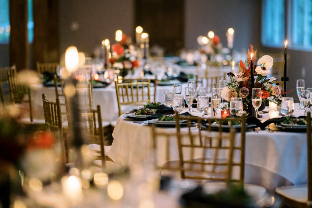 Kirsten and AJ’s September Wedding at Arrow Park, NY
Kirsten and AJ’s wedding day was a bit chilly and rainy, but their flexibility and positivity turned the day into a magical celebration. Originally planned for the garden, the ceremony was moved indoors due to the autumn rain. The staff at Arrow Park seamlessly transitioned the setup to the mansion’s main floor, creating an intimate and elegant ceremony space. The historic charm of the mansion, with its grand details and warm ambiance, added a cozy, romantic touch to their special day.
Kirsten, a talented fashion designer, surprised everyone—including her groom, AJ—by wearing a stunning black velvet strapless dress with an oversized white bow draping dramatically down the back. She designed the dress herself, and it was a show-stopper that perfectly reflected her unique style. The ceremony was heartfelt and personal, with family and friends gathering close to witness Kirsten and AJ’s vows.
After the ceremony, the main mansion was transformed to host a lively cocktail hour. Guests mingled and enjoyed delicious hors d'oeuvres while the reception space in the pavilion was being prepared. Kirsten and AJ’s attention to detail shone through in their décor choices, including the black-and-white checkered flooring that gave the pavilion a retro vibe. It was a perfect blend of modern chic and classic sophistication.
The reception began with Kirsten and AJ’s grand entrance, greeted by cheers from their guests. Their first dance was sweet and endearing, setting the tone for a night of joy and celebration. As the evening progressed, the party ramped up with enthusiastic dancing, heartfelt toasts, and even a surprise performance—a few uncles took the mic for an impromptu rap song that brought the house down.
Arrow Park provided the perfect backdrop for Kirsten and AJ’s wedding. With its blend of natural beauty and historic architecture, it’s an ideal venue for couples seeking a mix of indoor and outdoor spaces. The mansion offers a timeless elegance, while the pavilion provides a versatile setting for larger receptions.
Planning Tips for Future Couples at Arrow Park:
1. Have a Rain Plan: September weather can be unpredictable, so work with the Arrow Park staff to plan for both indoor and outdoor options. The mansion’s interiors provide a stunning alternative for ceremonies or cocktail hours.
2. Maximize the Pavilion: The pavilion’s spacious layout can accommodate various themes and setups. Consider unique flooring, lighting, or drapery to make the space your own.
3. Embrace the Venue’s Charm: Use the mansion’s historic features—like the fireplaces and vintage decor—as part of your wedding aesthetic. It’s a built-in backdrop that needs little embellishment.
4. Plan Time for Photos: Arrow Park’s grounds are breathtaking, especially in the fall. Schedule time with your photographer to capture the beauty of the lake, gardens, and mansion.
Kirsten and AJ’s wedding was a true testament to the power of creativity, adaptability, and love. Their celebration at Arrow Park was unforgettable, and I’m grateful to have been a part of their special day.
Thankful for all the wedding vendors that made this day possible:⁠
Venue: @arrowparkny
Catering: @lovenrosemary
Kirsten and AJ Arrow Park NY Wedding documented by Karis from Hey Karis New York, Brooklyn, Hudson Valley NY and Catskills NY and NJ Wedding and NYC Elopement Photographer.