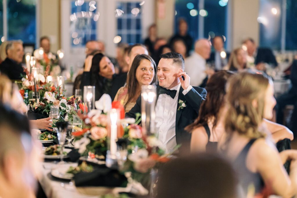 Kirsten and AJ’s September Wedding at Arrow Park, NY
Kirsten and AJ’s wedding day was a bit chilly and rainy, but their flexibility and positivity turned the day into a magical celebration. Originally planned for the garden, the ceremony was moved indoors due to the autumn rain. The staff at Arrow Park seamlessly transitioned the setup to the mansion’s main floor, creating an intimate and elegant ceremony space. The historic charm of the mansion, with its grand details and warm ambiance, added a cozy, romantic touch to their special day.
Kirsten, a talented fashion designer, surprised everyone—including her groom, AJ—by wearing a stunning black velvet strapless dress with an oversized white bow draping dramatically down the back. She designed the dress herself, and it was a show-stopper that perfectly reflected her unique style. The ceremony was heartfelt and personal, with family and friends gathering close to witness Kirsten and AJ’s vows.
After the ceremony, the main mansion was transformed to host a lively cocktail hour. Guests mingled and enjoyed delicious hors d'oeuvres while the reception space in the pavilion was being prepared. Kirsten and AJ’s attention to detail shone through in their décor choices, including the black-and-white checkered flooring that gave the pavilion a retro vibe. It was a perfect blend of modern chic and classic sophistication.
The reception began with Kirsten and AJ’s grand entrance, greeted by cheers from their guests. Their first dance was sweet and endearing, setting the tone for a night of joy and celebration. As the evening progressed, the party ramped up with enthusiastic dancing, heartfelt toasts, and even a surprise performance—a few uncles took the mic for an impromptu rap song that brought the house down.
Arrow Park provided the perfect backdrop for Kirsten and AJ’s wedding. With its blend of natural beauty and historic architecture, it’s an ideal venue for couples seeking a mix of indoor and outdoor spaces. The mansion offers a timeless elegance, while the pavilion provides a versatile setting for larger receptions.
Planning Tips for Future Couples at Arrow Park:
1. Have a Rain Plan: September weather can be unpredictable, so work with the Arrow Park staff to plan for both indoor and outdoor options. The mansion’s interiors provide a stunning alternative for ceremonies or cocktail hours.
2. Maximize the Pavilion: The pavilion’s spacious layout can accommodate various themes and setups. Consider unique flooring, lighting, or drapery to make the space your own.
3. Embrace the Venue’s Charm: Use the mansion’s historic features—like the fireplaces and vintage decor—as part of your wedding aesthetic. It’s a built-in backdrop that needs little embellishment.
4. Plan Time for Photos: Arrow Park’s grounds are breathtaking, especially in the fall. Schedule time with your photographer to capture the beauty of the lake, gardens, and mansion.
Kirsten and AJ’s wedding was a true testament to the power of creativity, adaptability, and love. Their celebration at Arrow Park was unforgettable, and I’m grateful to have been a part of their special day.
Thankful for all the wedding vendors that made this day possible:⁠
Venue: @arrowparkny
Catering: @lovenrosemary
Kirsten and AJ Arrow Park NY Wedding documented by Karis from Hey Karis New York, Brooklyn, Hudson Valley NY and Catskills NY and NJ Wedding and NYC Elopement Photographer.