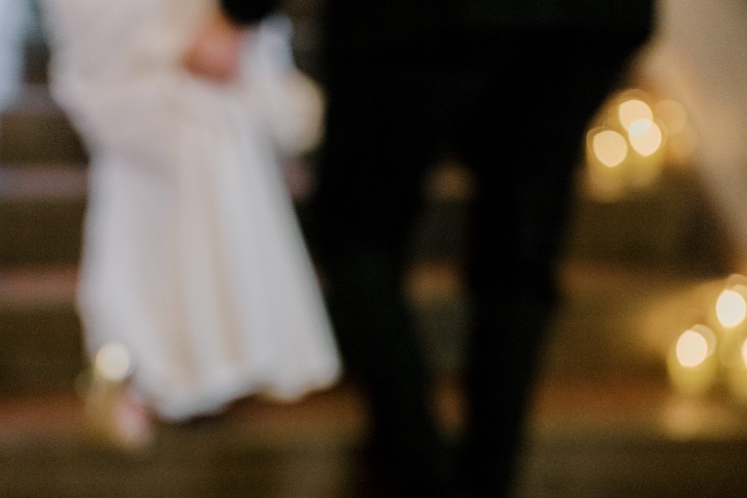 Kelsey and Liron Winter Wedding at Arrow Park, NY
My first wedding at Arrow Park was back in June 2022 when I had the pleasure of photographing Jackie and Aron’s wedding. From that moment, other wedding inquiries and opportunities arose, allowing me to capture the love stories of more wonderful couples at Arrow Park. That’s how I met Kelsey. Kelsey is the sales manager at Arrow Park, and since then, she has been a fan of my work. When it came time to plan her own wedding, I was delighted and honored that she chose me to document her beautiful celebration at Arrow Park.
Kelsey was well-prepared for the chilly weather, as she was getting married in December, so the wedding took place inside the mansion. When I arrived, Kelsey was finishing up her hair and makeup, just about ready to put on her dress. Families started to arrive, filling the space with warm greetings and laughter—one of my favorite scenes to witness on a wedding morning. Kelsey stepped into her dress, slipped on her gloves, and completed her final wedding preparations. She sparkled even more than the diamond on her finger as she walked over to see her groom.
As Kelsey walked down the aisle escorted by her father, emotions filled the room. Tears welled up in the eyes of their family and friends while Liron stood at the altar, watching her with a big smile. With their loved ones witnessing, Kelsey and Liron exchanged vows and sealed their marriage with a kiss.
Cocktail hour began with delicious hors d'oeuvres and drinks in hand, as guests excitedly welcomed the newlyweds into the room. Midway through the reception, Albanian dancers performed a traditional folk dance, bringing everyone to the dance floor as one big family. The night was filled with joy, laughter, and celebration. As all fun times do, the evening eventually came to an end, and we sent off Kelsey and Liron with a magical sparkler exit.
Winter Wedding Tips for Arrow Park, NY:
1. Embrace the Indoor Spaces: Arrow Park’s mansion provides an elegant and cozy setting for a winter wedding. The warm fireplaces and historic charm create a romantic atmosphere perfect for a chilly December day.
2. Prepare for the Cold: If you’re planning a winter wedding, consider stylish layers like faux fur wraps, long-sleeved dresses, or elegant gloves to stay warm while looking stunning.
3. Plan for Early Sunset: Winter days are shorter, so plan your timeline accordingly to make the most of natural light for photos. Consider a first look to capture beautiful portraits before it gets dark.
4. Add Seasonal Touches: Enhance the winter wedding ambiance with seasonal decor, such as candles, string lights, evergreen arrangements, and warm color palettes to complement the cozy indoor setting.
5. Offer Warm Beverages: Keep guests comfortable by serving hot cocoa, mulled wine, or warm cider during cocktail hour to add a festive and welcoming touch.
Kelsey and Liron’s wedding was a perfect example of how a winter celebration at Arrow Park can be both intimate and breathtaking. I was honored to capture their special day and look forward to photographing more magical winter weddings in this beautiful venue.
Kelsey and Liron's Arrow Park NY Wedding documented by Karis from Hey Karis New York, Brooklyn, Hudson Valley NY and Catskills NY and NJ Wedding and NYC Elopement Photographer.
